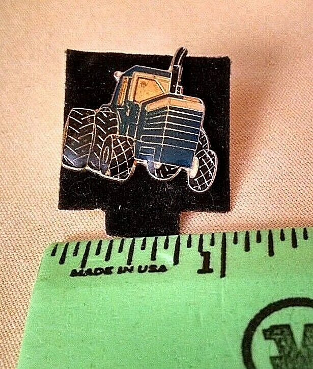 TRACTOR PIN NOS BLUE GOLD BLACK METAL BACK 1 X 13/16 LAPEL HAT DUAL WHEEL CAB.