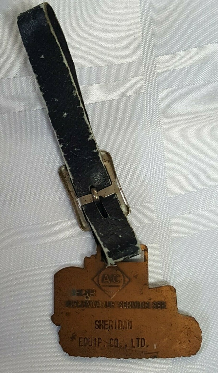 AC SHERIDAN EQUIPMENT FOB BADGE ON LEATHER STRAP AGRACULTURE FARM TRACTOR METAL