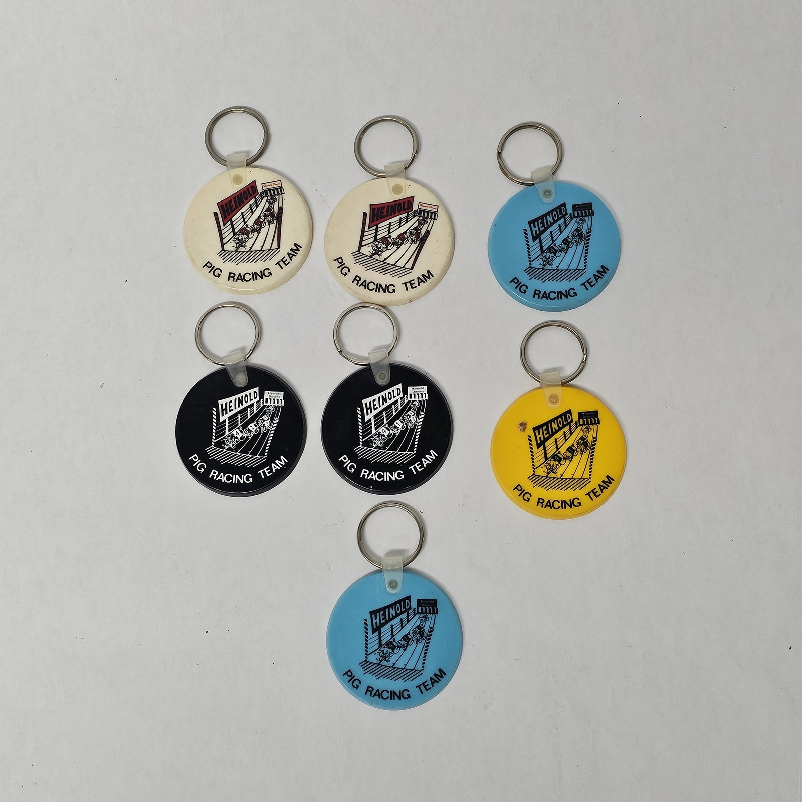7 Heinold Hogs Pig Racing Team Vintage Advertising Keychains Lot Agriculture