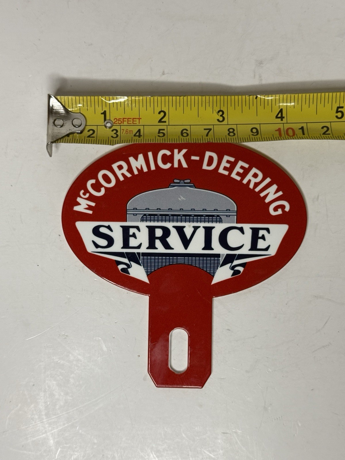 McCormick-Deering Service Advertising 4 1/4”x4 1/4” Qual License Plate Topper