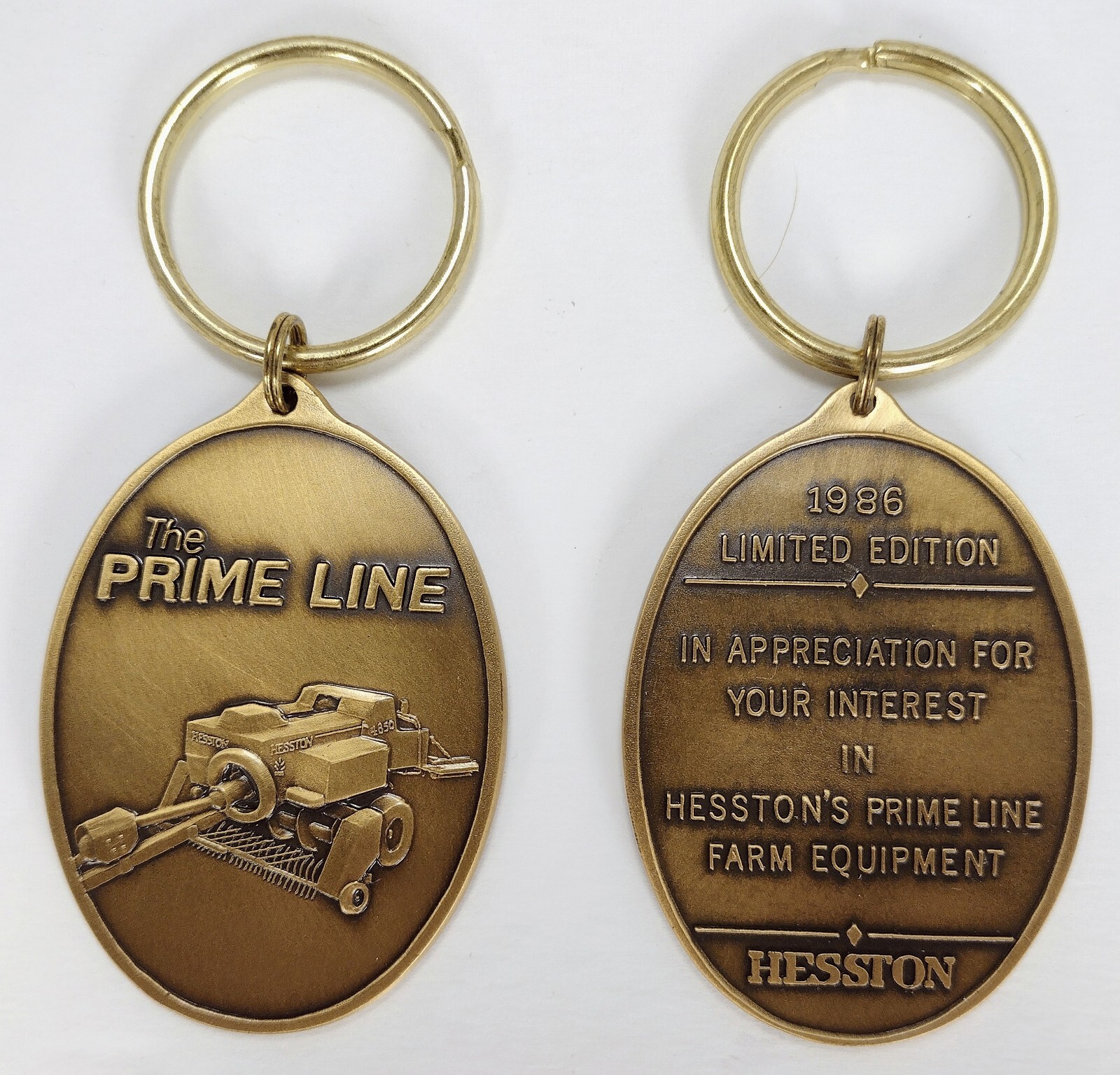 2 Vintage Metal The Prime Line 1986 Limited Edition Hesston Key Chain Bronze