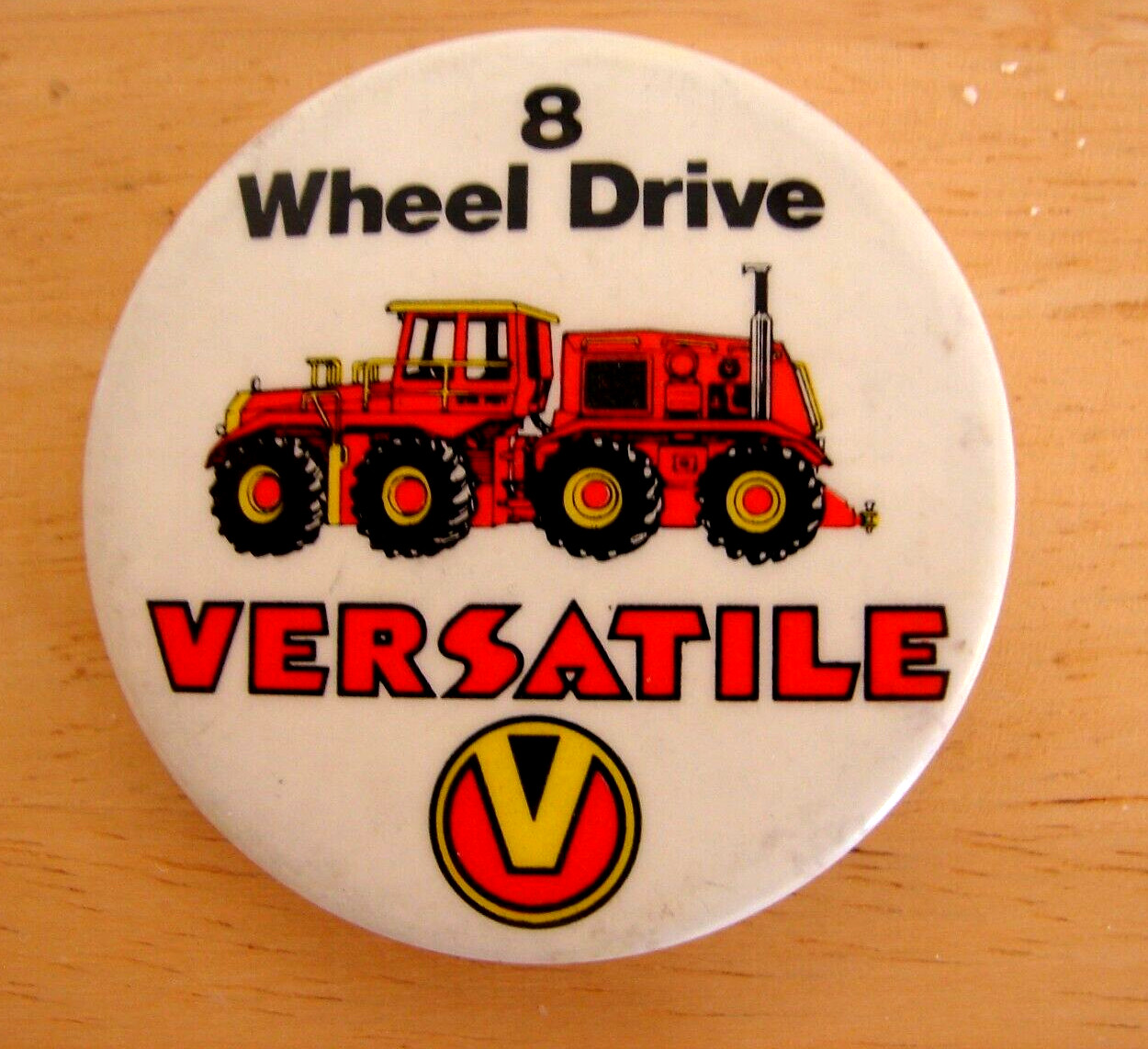 VINTAGE VERSATILE 8 WHEEL DRIVE TRACTOR PINBACK BUTTON