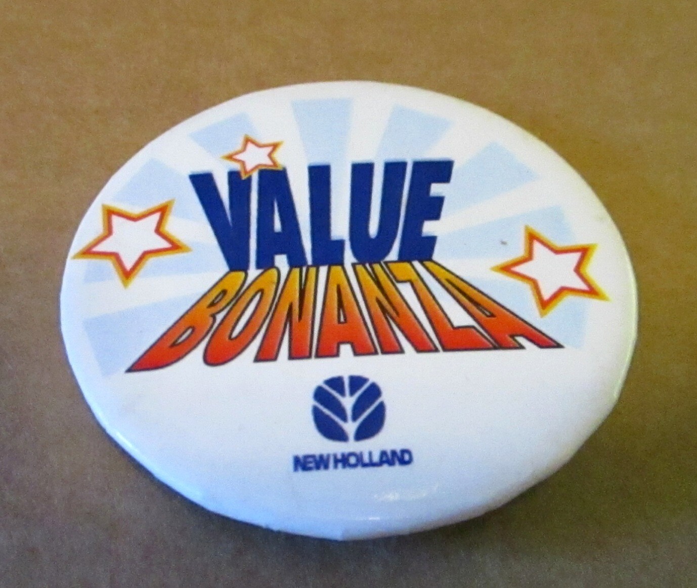 New Holland Trademark Logo Parts Value Bonanza Pinback Button Pin Collectible NH