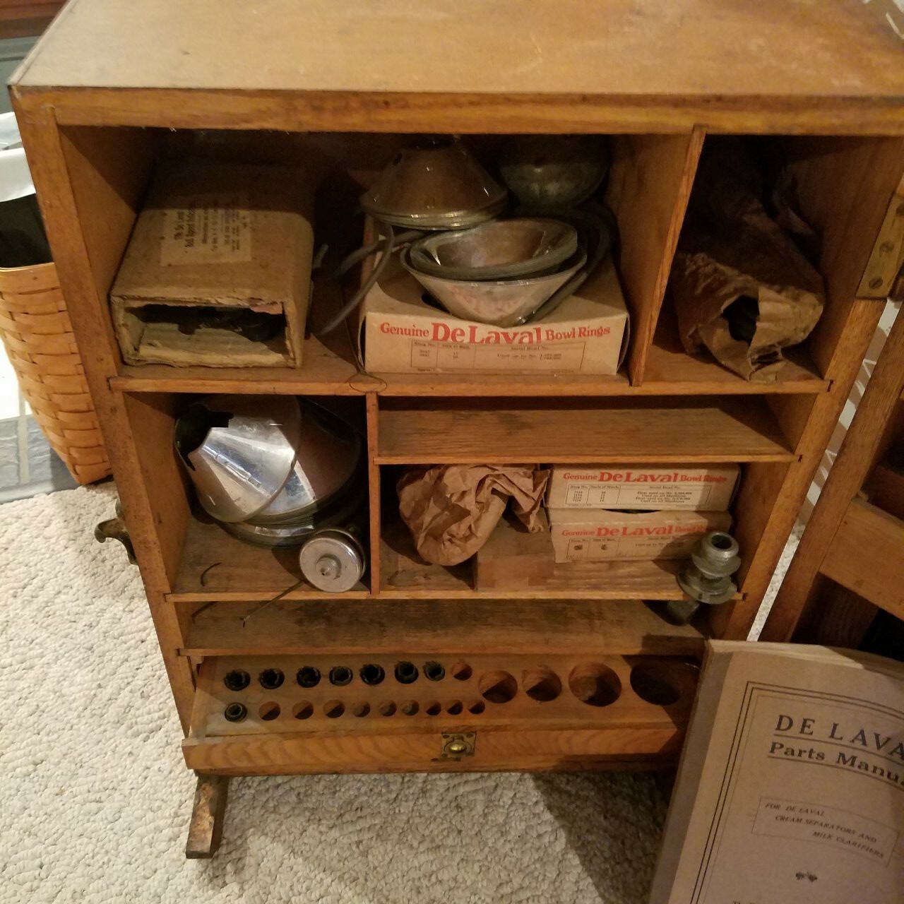 ANTIQUE DE LAVAL CREAM SEPARATORS AMERICAN OAK PARTS CABINET, W/ ORIGINAL PARTS
