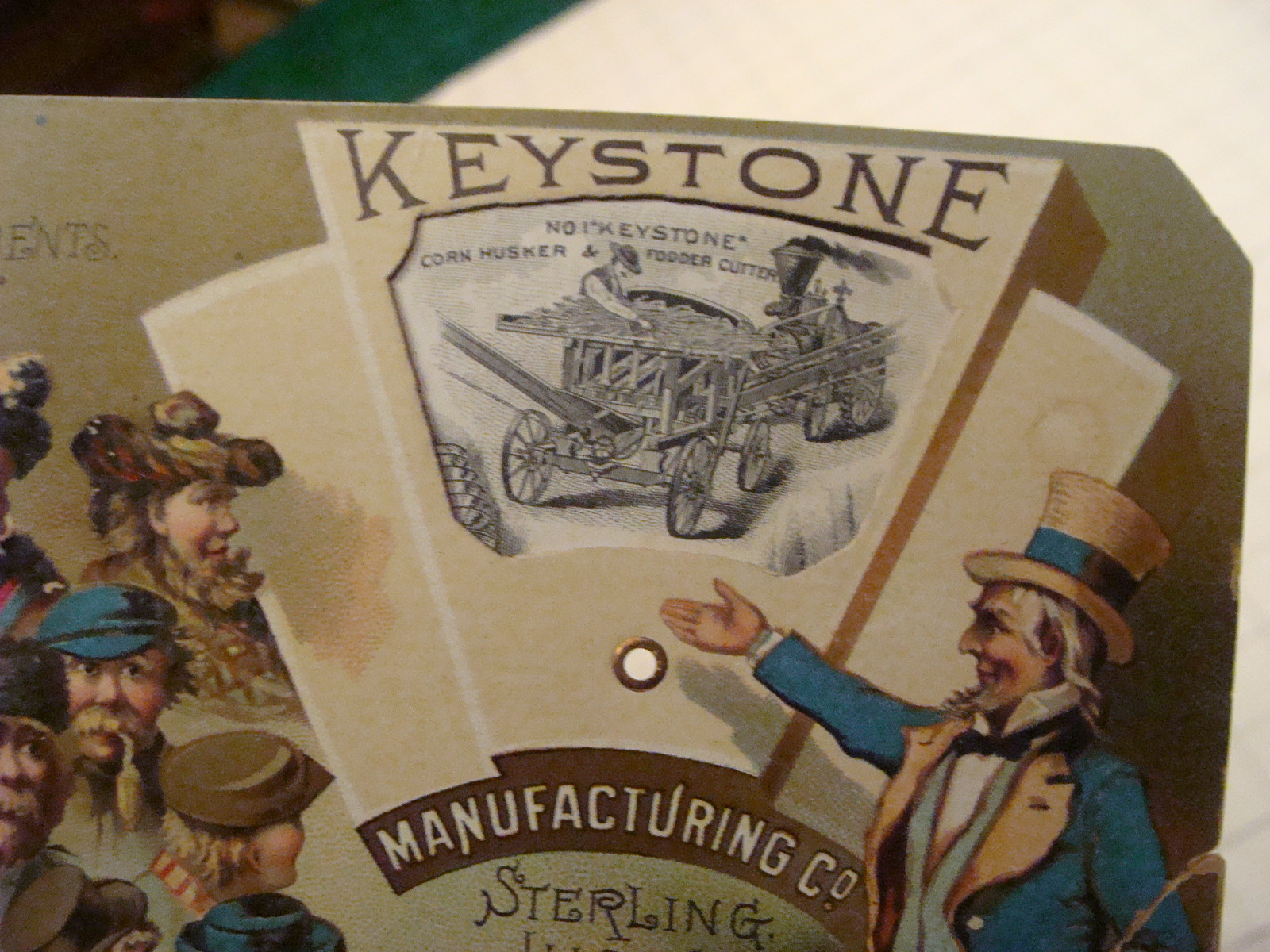 vintage Mechanical TradeCard: KEYSTONE w Farming items; UNCLE SAM showing world