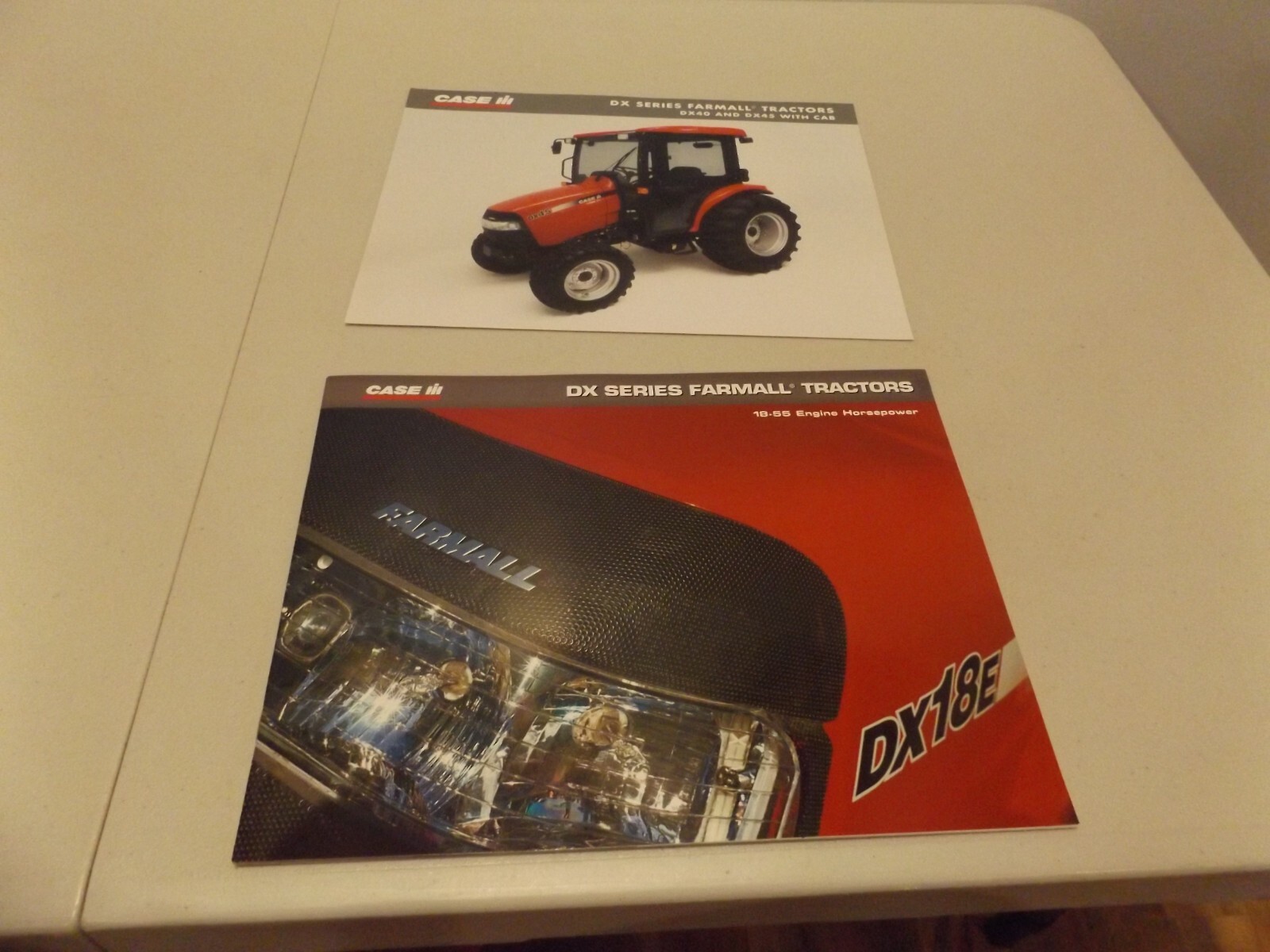 2-pc. CASE-IH DX SERIES TRACTORS, # CIH7250602 2005, CIH9300404 020580 2005