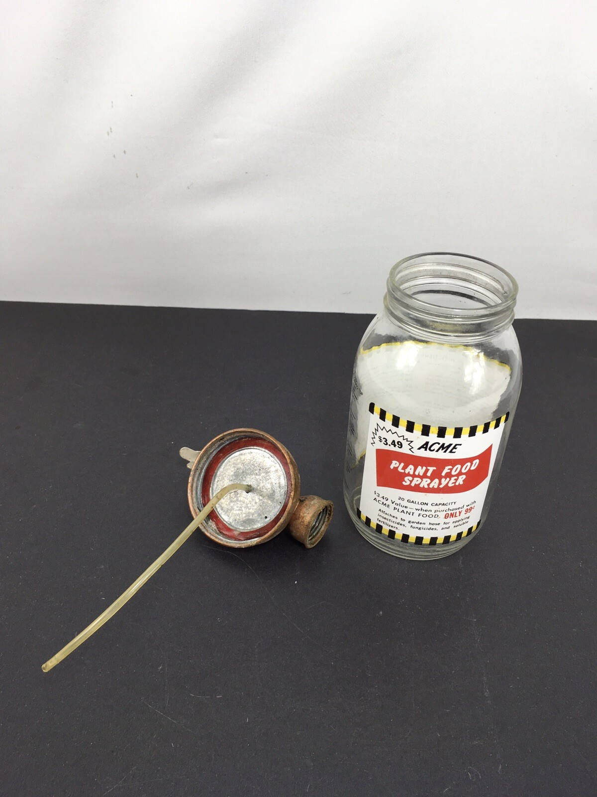 Acme Vintage Advertising Even Flow Plant Food Lawn Sprayer Glass Jar Hose