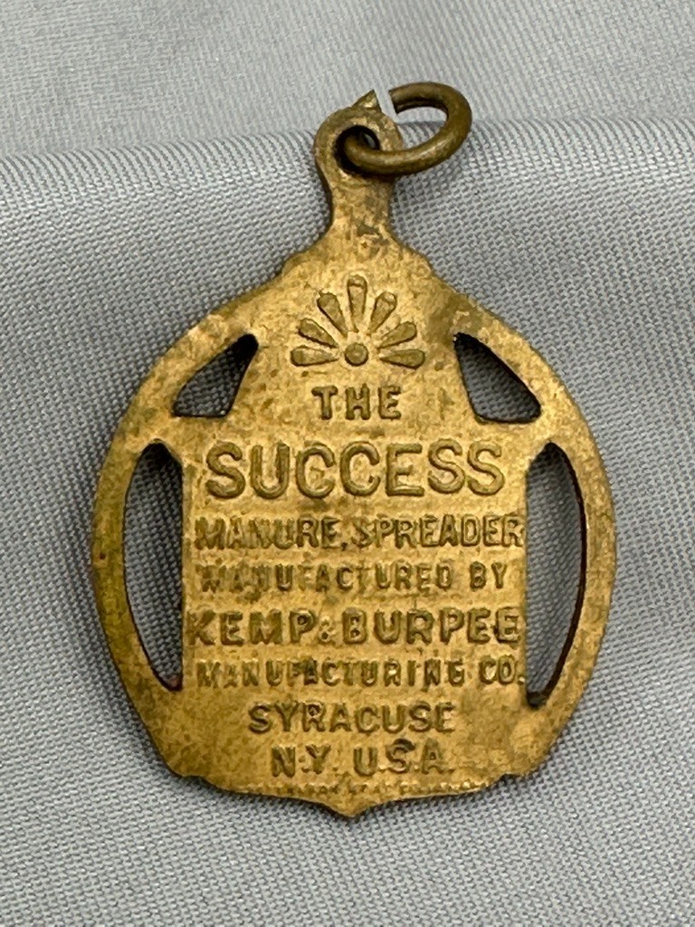 Antique The Success Manure Spreader Watch Key Fob Kemp Burpee Farm Advertising