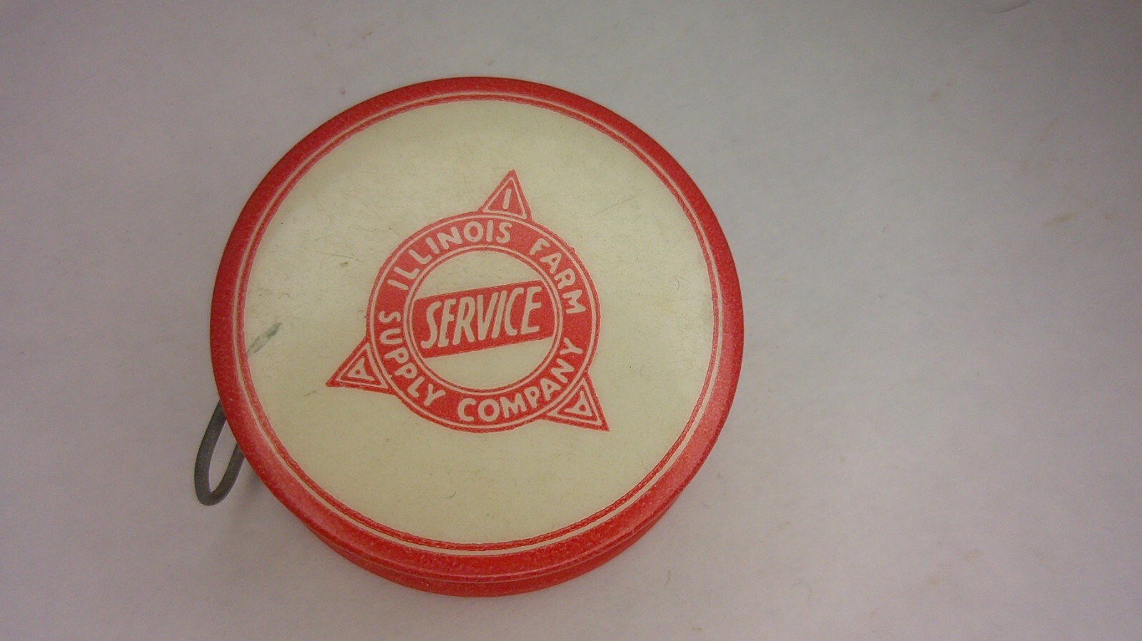 advertising celluloid tape measure retractable Illinois Farm Supply co. Z141