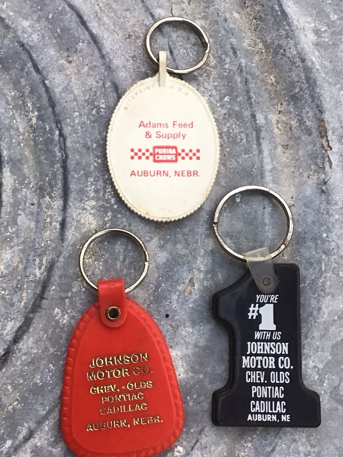 3 Vintage Auburn Nebraska Advertising Key Chain Johnson Motors & Adam’s Purina