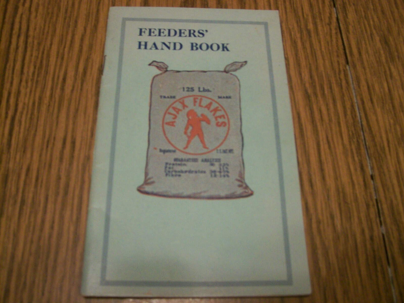 AJAX FLAKES FEEDERS HAND BOOK ROBERT W. CHAPIN INSTRUCTIONS FOR FEEDING CATTLE