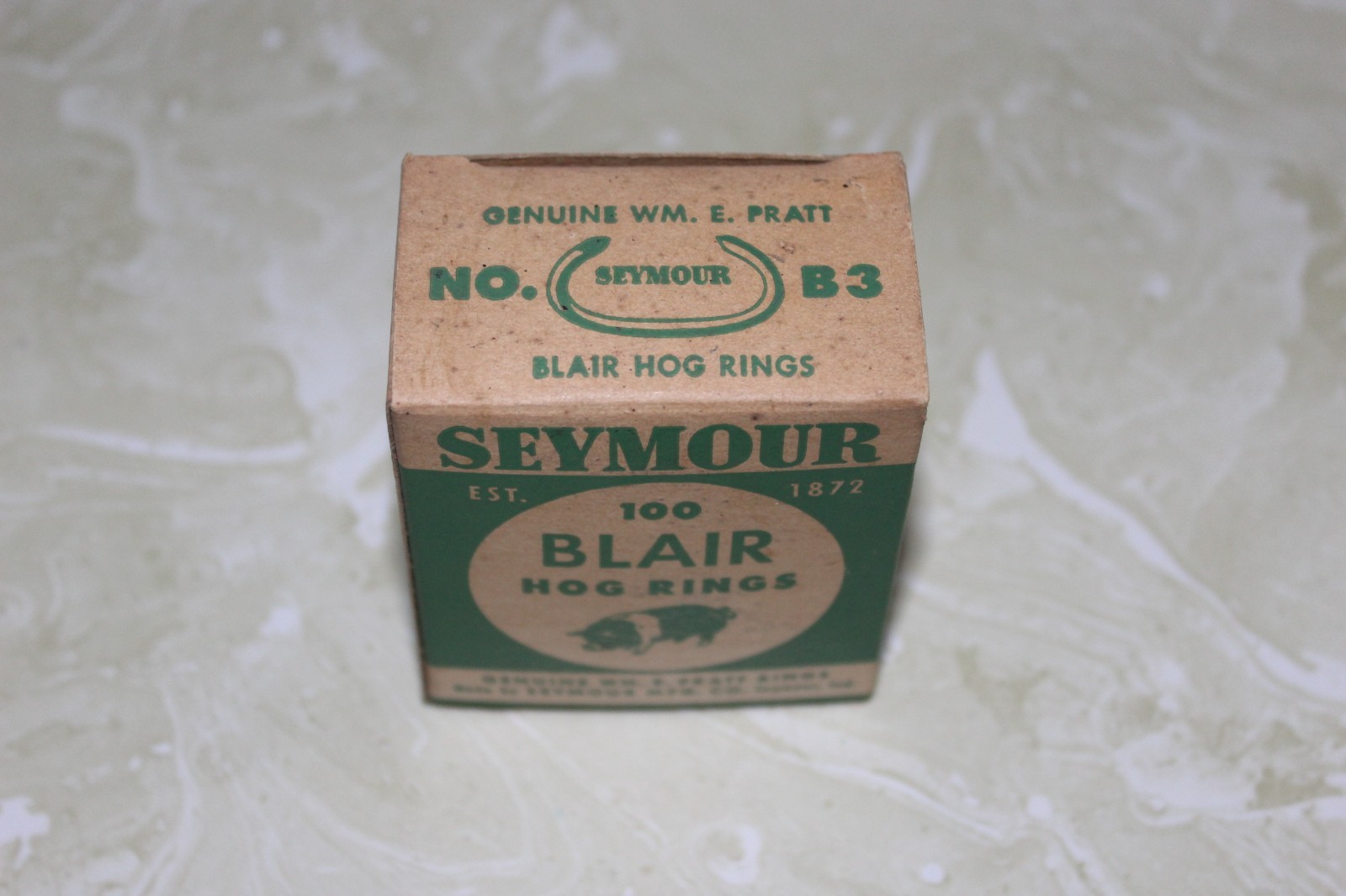NOS, BOX OF 100 SEYMOUR BLAIR HOG RINGS SEYMOUR MFG. CO. SEYMOUR, IND.