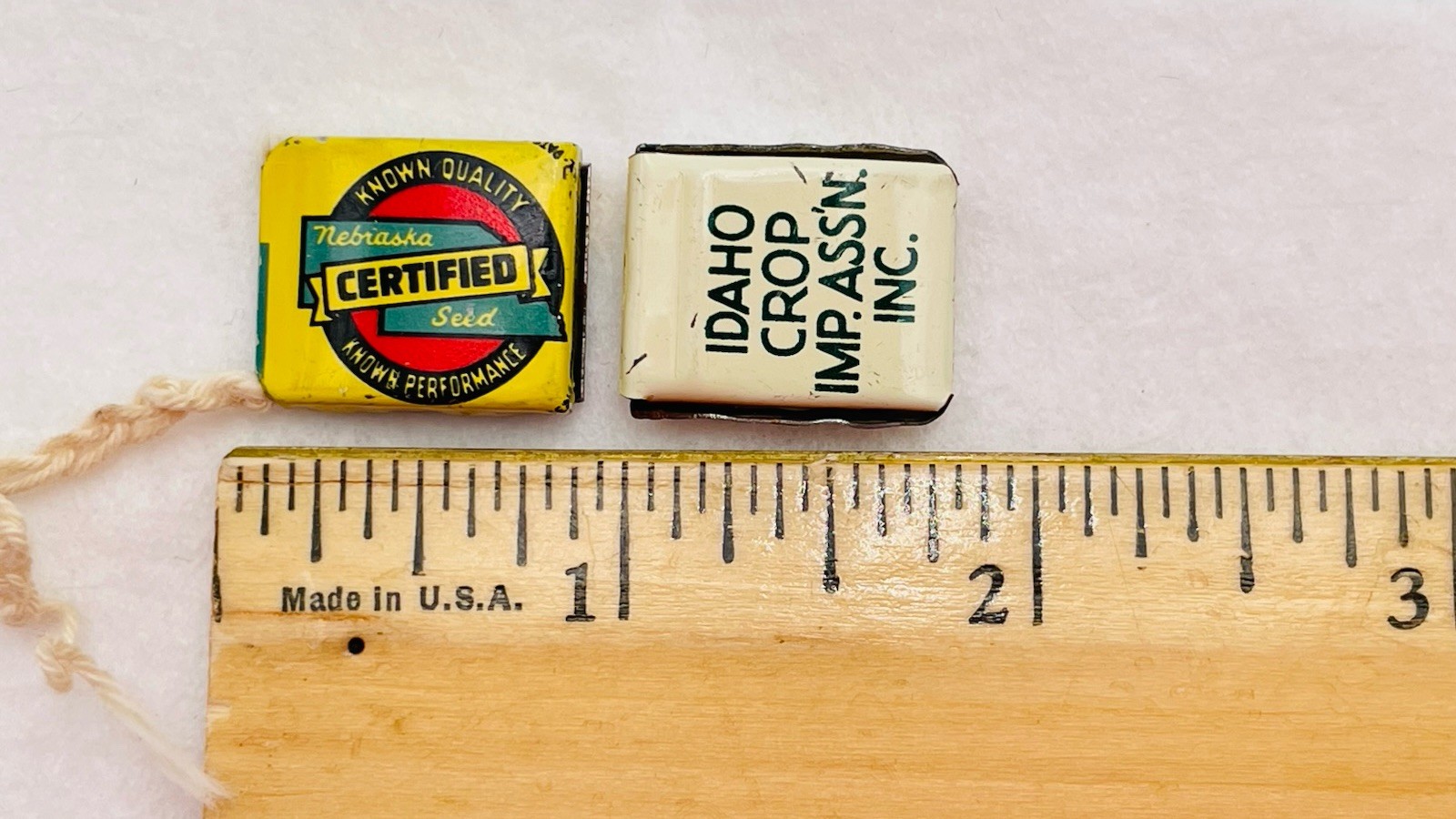 Lot 13 VTG Farm Metal Seed Bag Tag Clip NEBRASKA Crop Improvement Assoc & Idaho