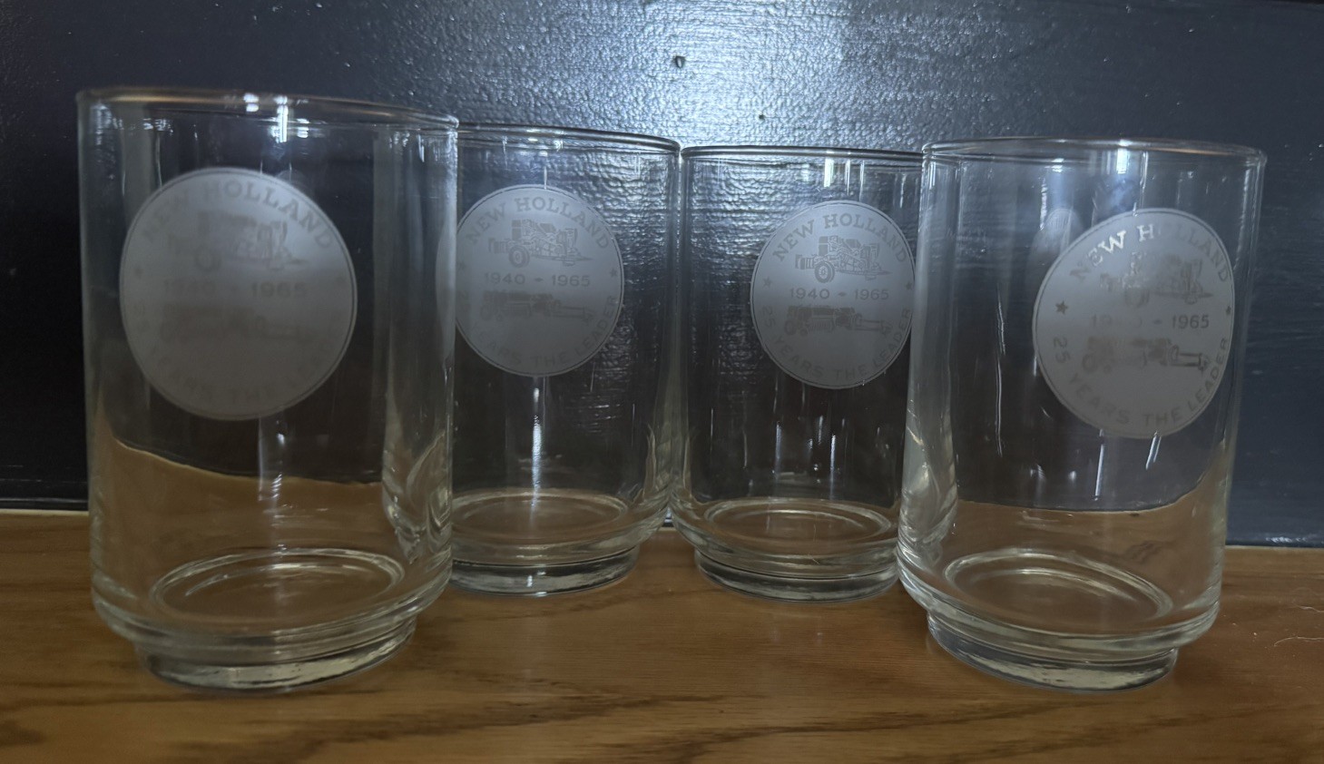 Sperry New Holland 25 Years The Leader Anniversary Glasses ‘40-‘65 Set of 4