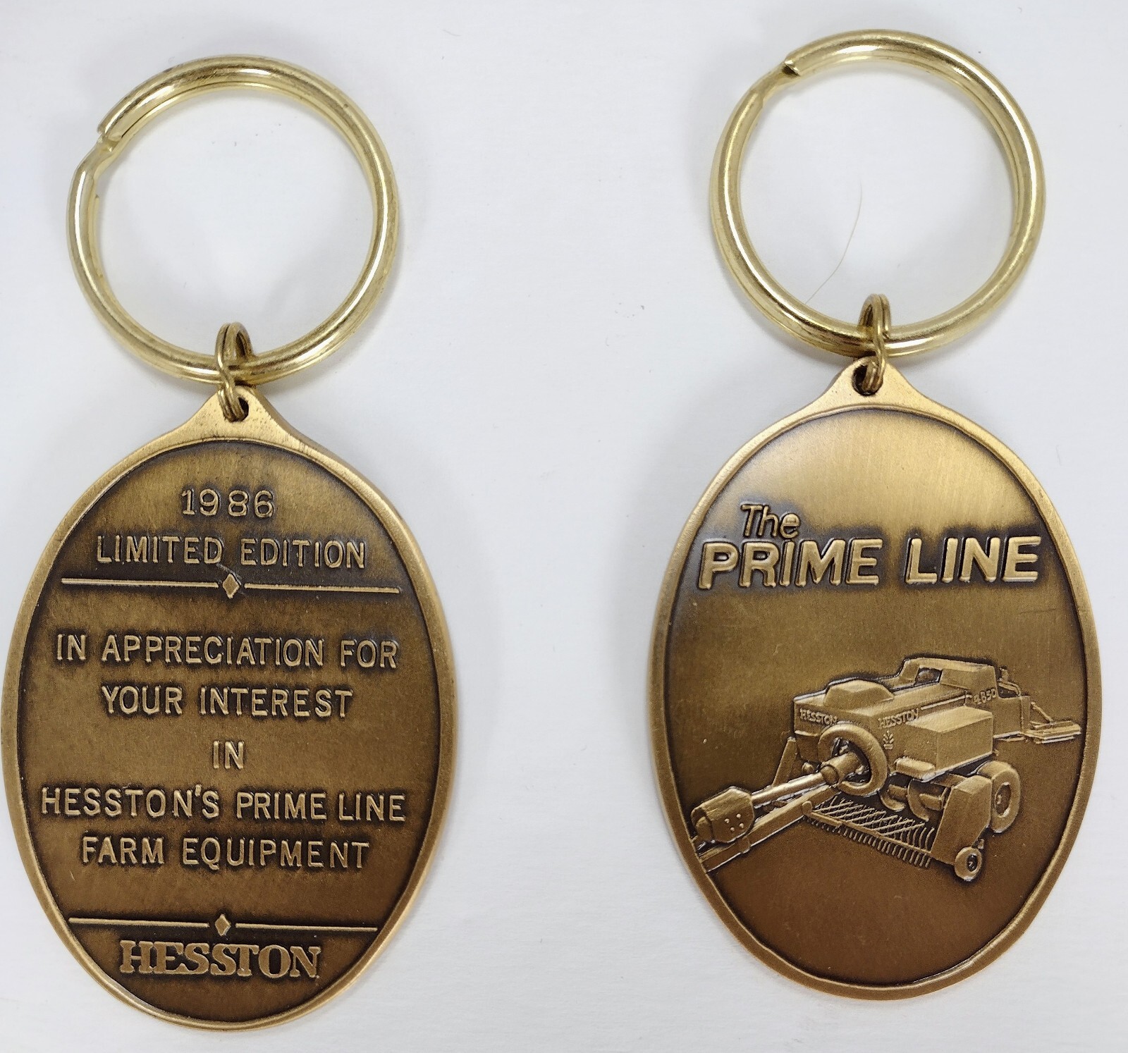 2 Vintage Metal The Prime Line 1986 Limited Edition Hesston Key Chain Bronze