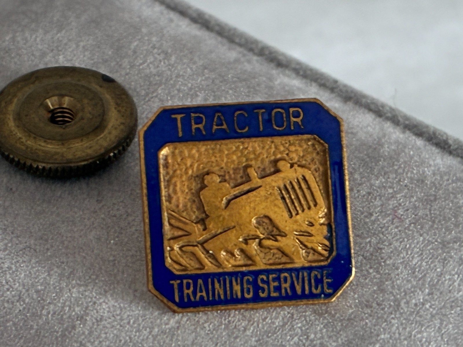 Vintage Blue Enamel and Brass TRACTOR TRAINING SERVICE Lapel Pin