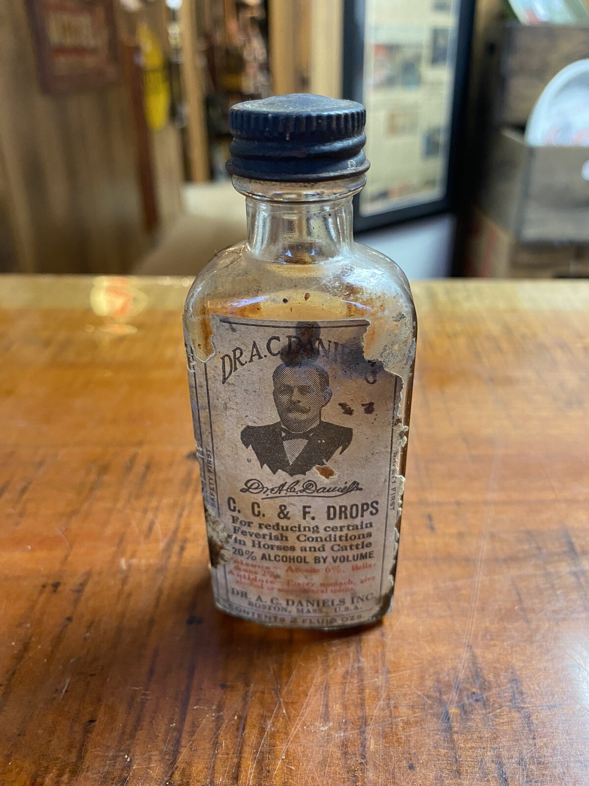 Vintage A.C. Daniels C.C.&F. Drops For Horses And Cattle Glass Bottle With Label