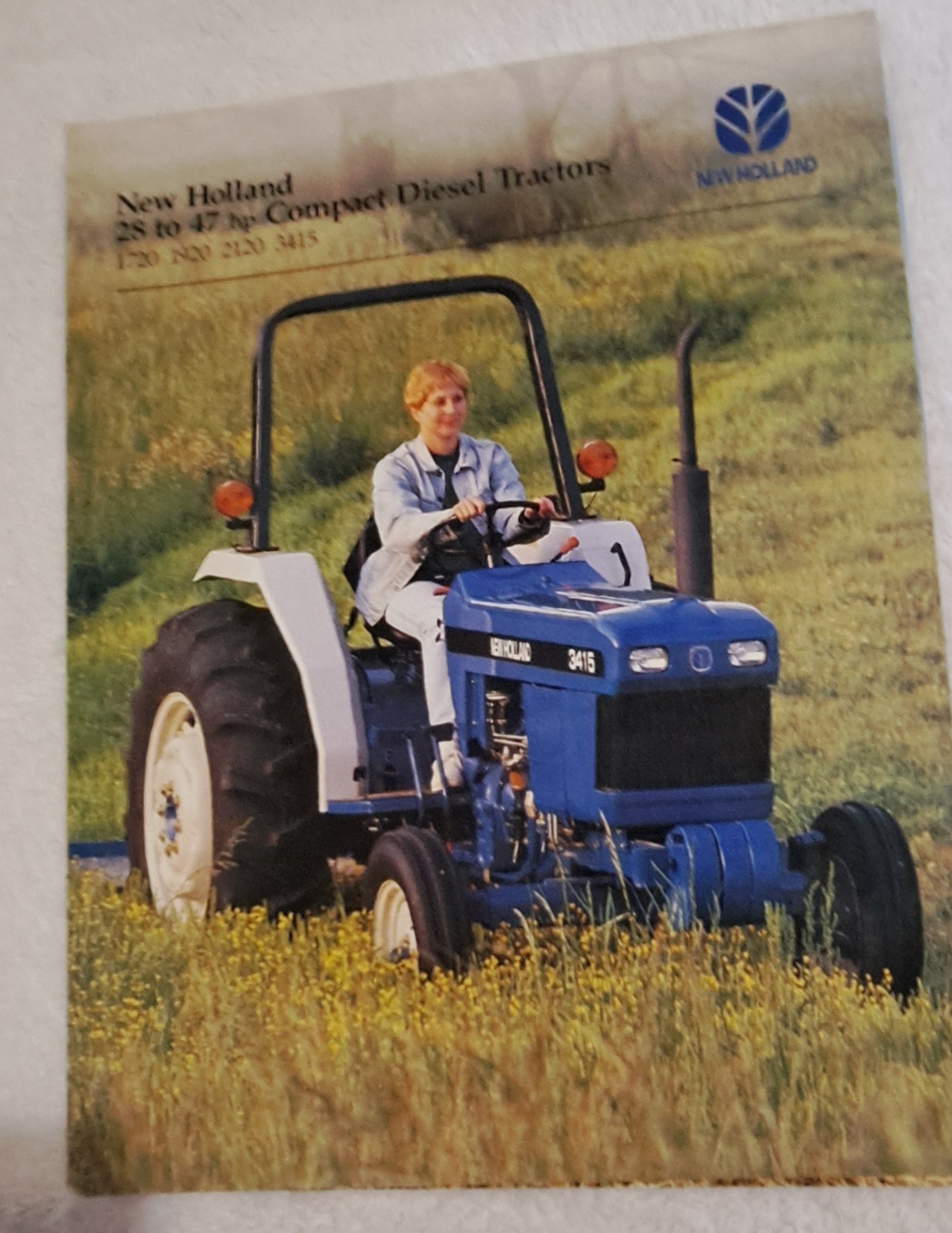 2 New Holland Tractor Brochures. 1998-1999. Compact Diesel, TN, TND, TNS