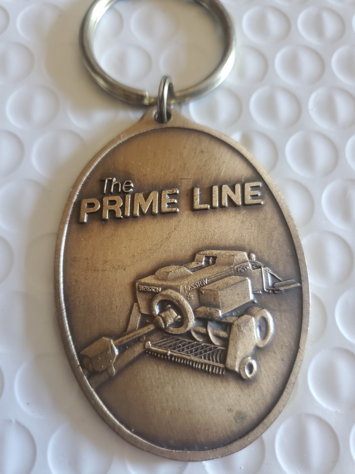 Vintage 1986 Hesston&rsquo;s The Prime Line Equipment Key Chain vtg.