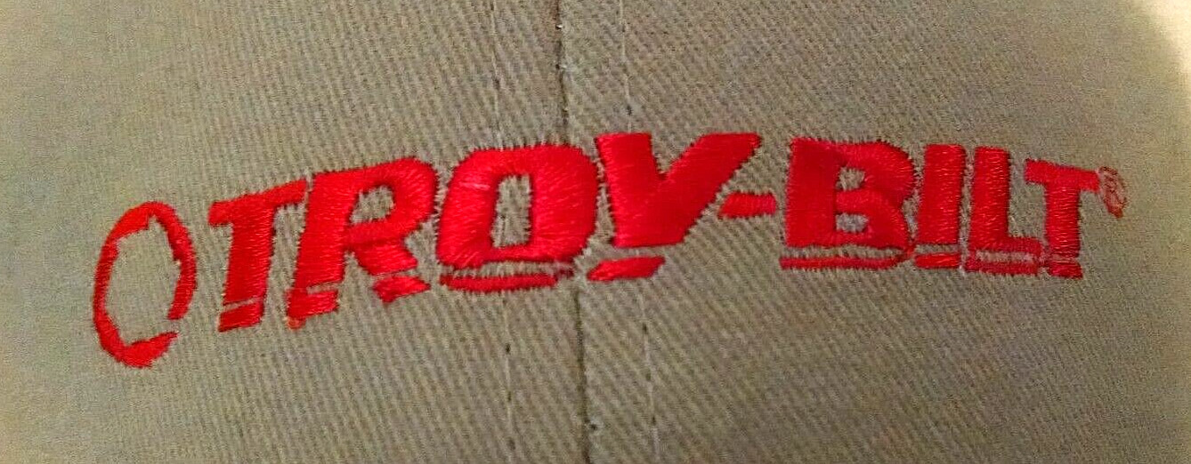 TROY-BILT HAT NEW BEIGE TAN RED LETTERING ADJ CLOTH STRAP WINTER BASEBALL CAP.