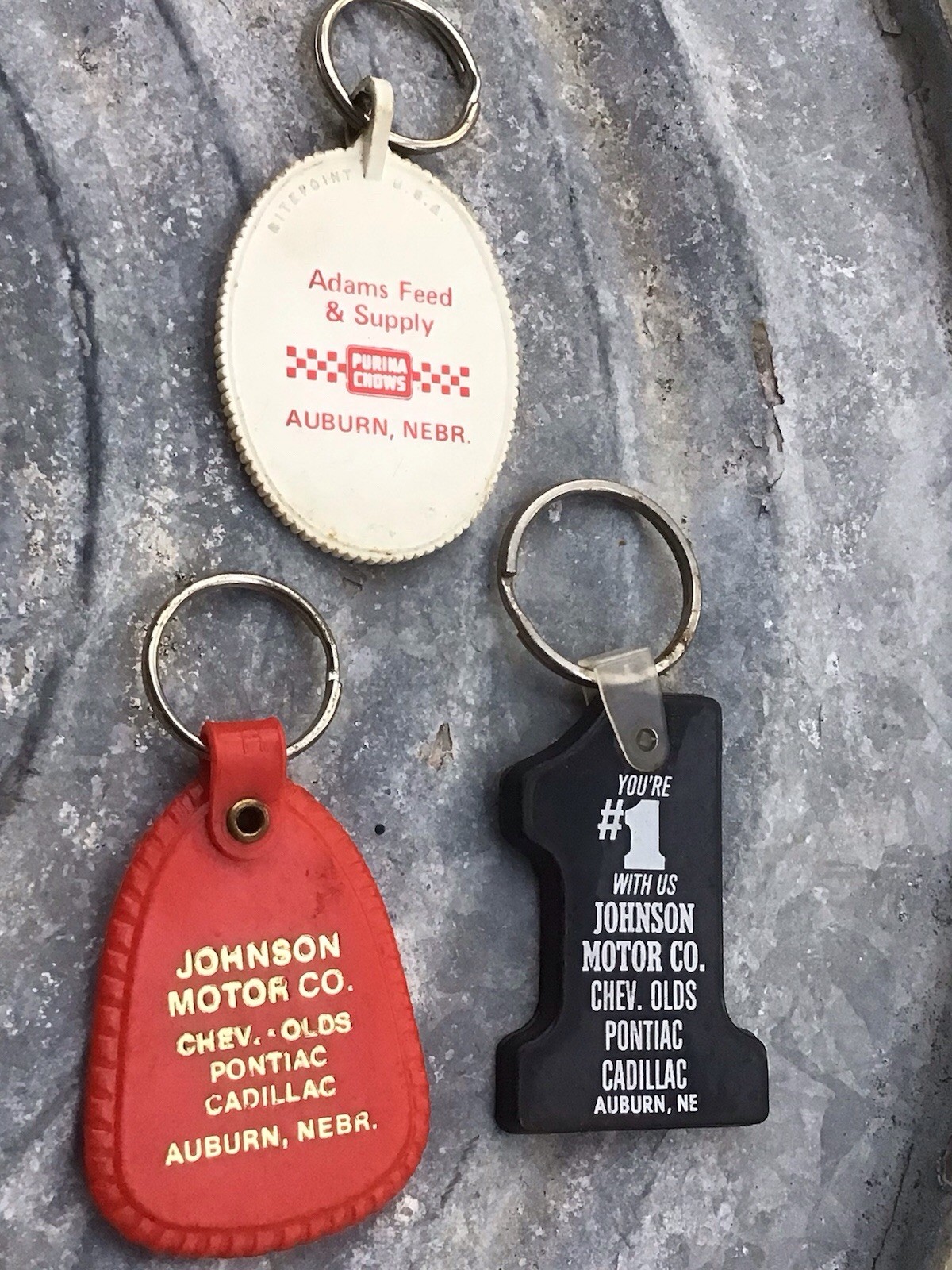 3 Vintage Auburn Nebraska Advertising Key Chain Johnson Motors & Adam’s Purina
