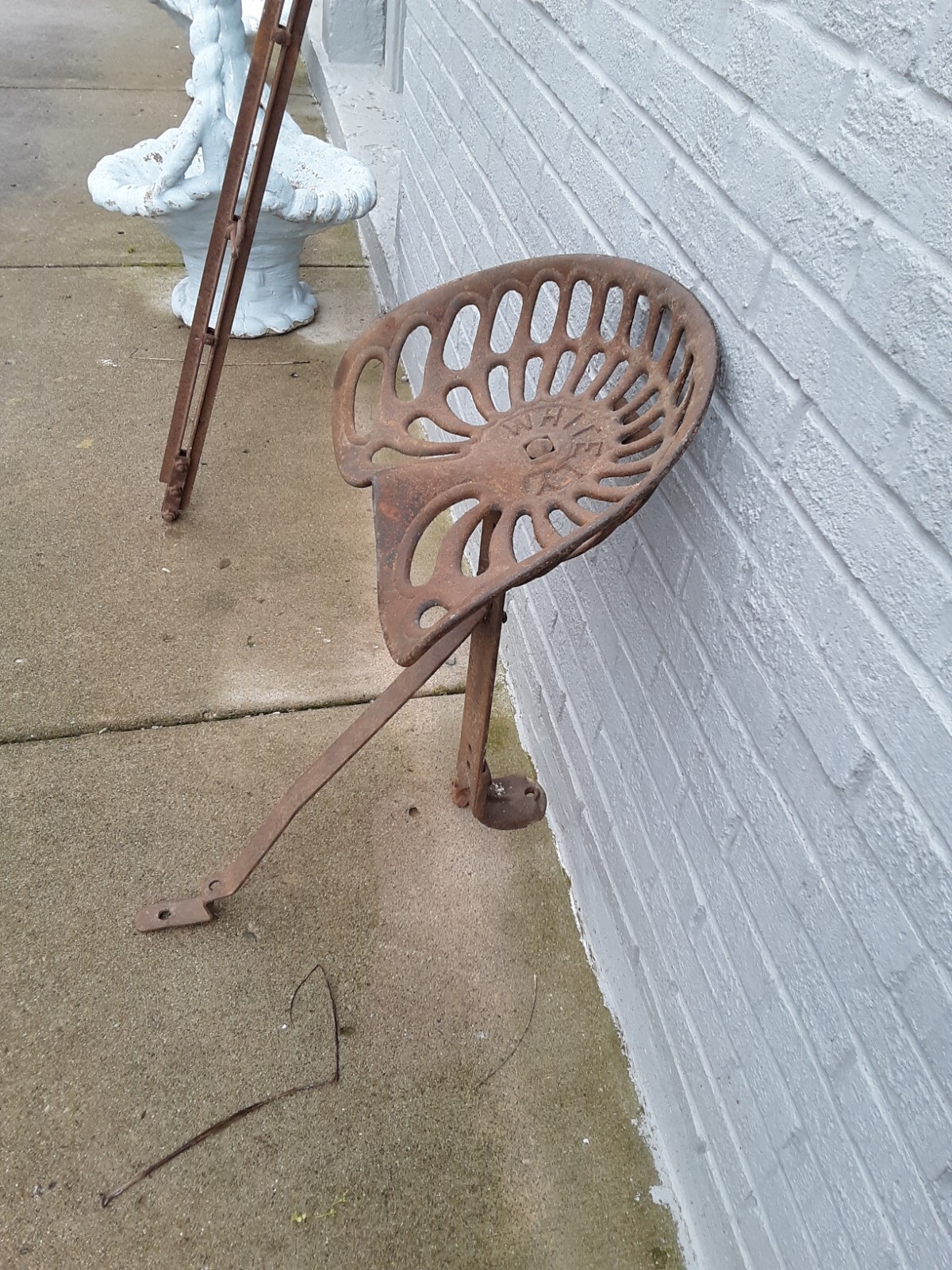 Antique Whitely Cast Iron Farm Tractor seat with original Assembly Post bracket