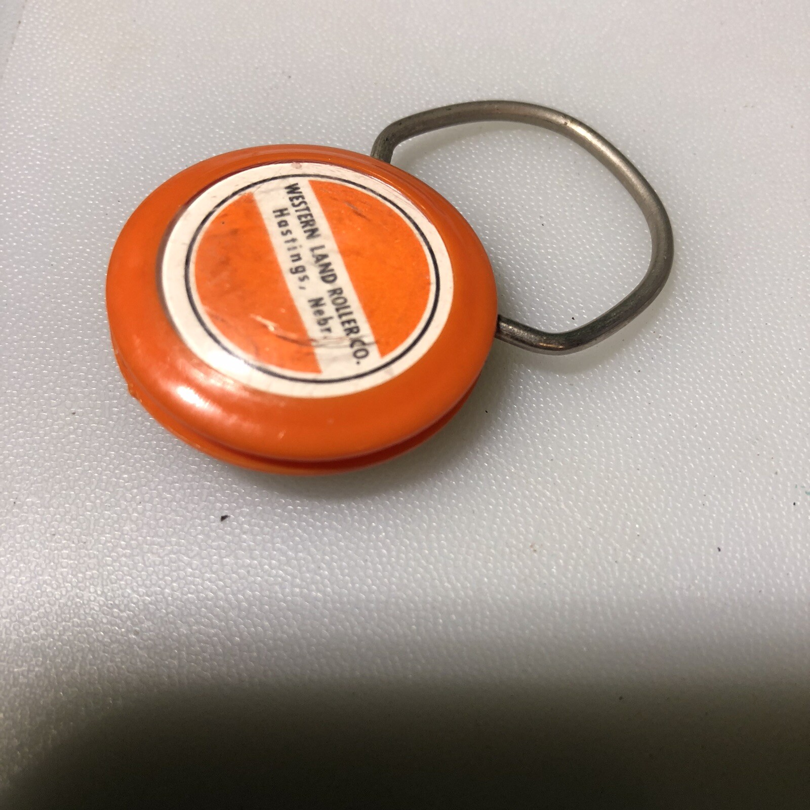 Hastings Nebraska Western Land Roller Co Bearcat Ag Farming Vintage Keychain