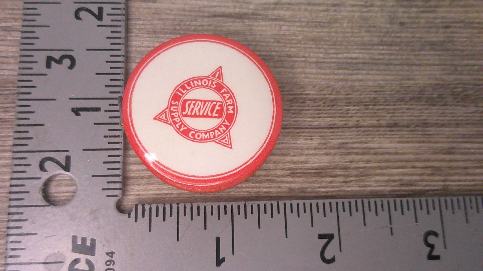 Illinois Farm supply co advertising celluloid tape measure has cloth tape works