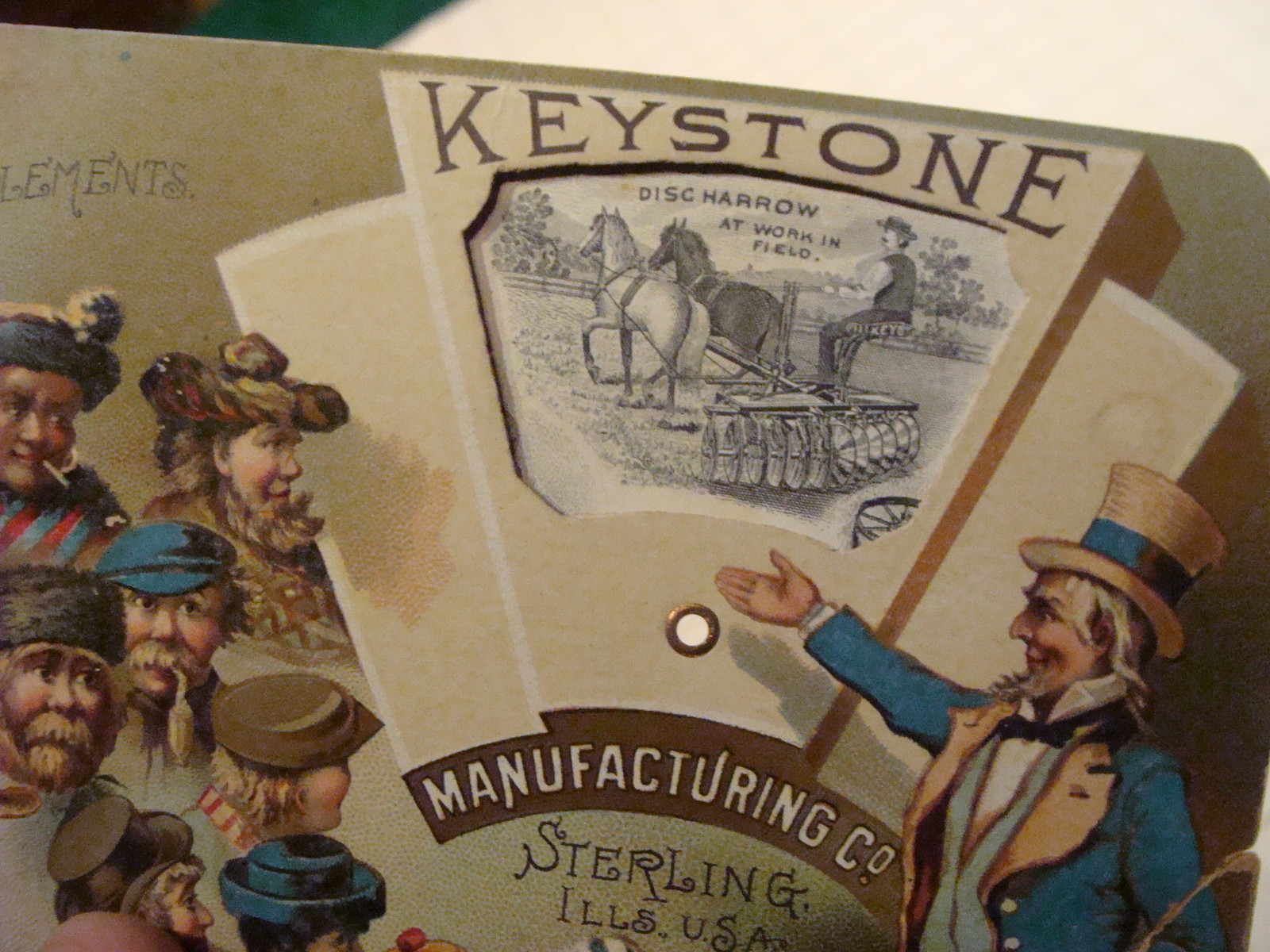 vintage Mechanical TradeCard: KEYSTONE w Farming items; UNCLE SAM showing world