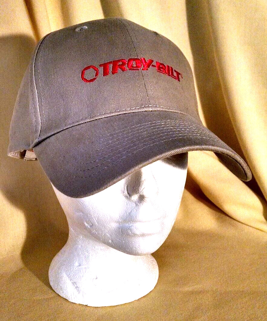 TROY-BILT HAT NEW BEIGE TAN RED LETTERING ADJ CLOTH STRAP WINTER BASEBALL CAP.