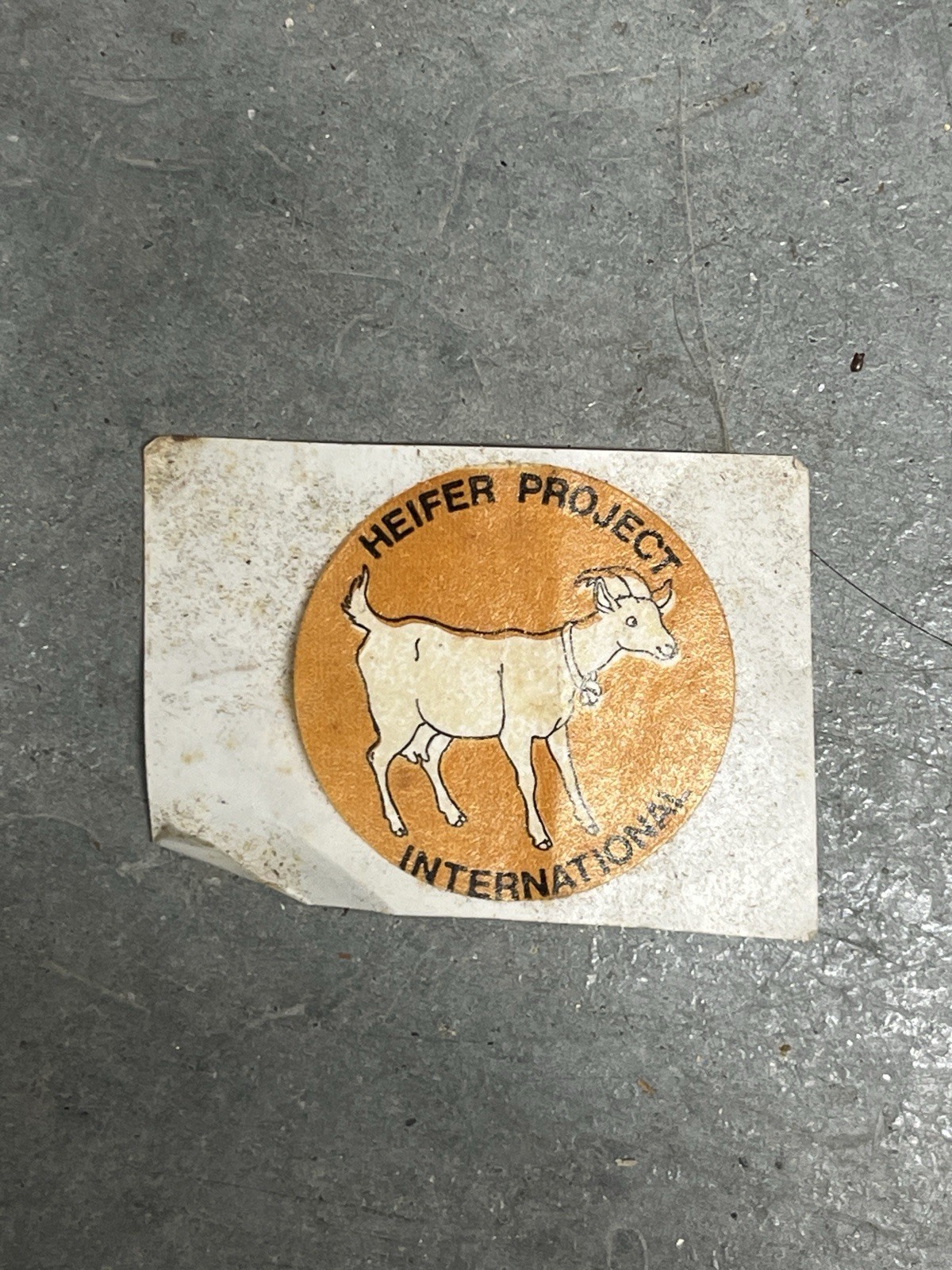 Heifer Project International Orange Circular Sticker