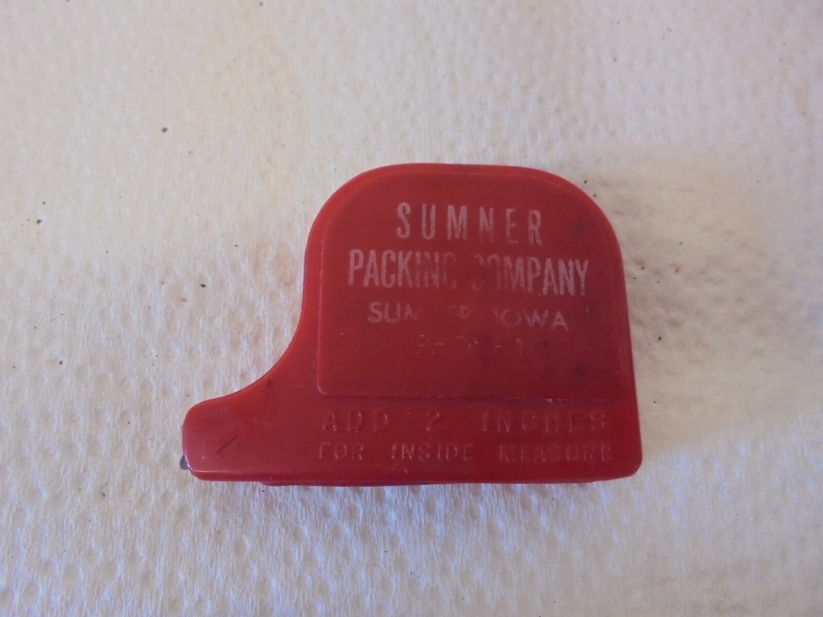 red plastic tape measure sumner packing company sumner iowa