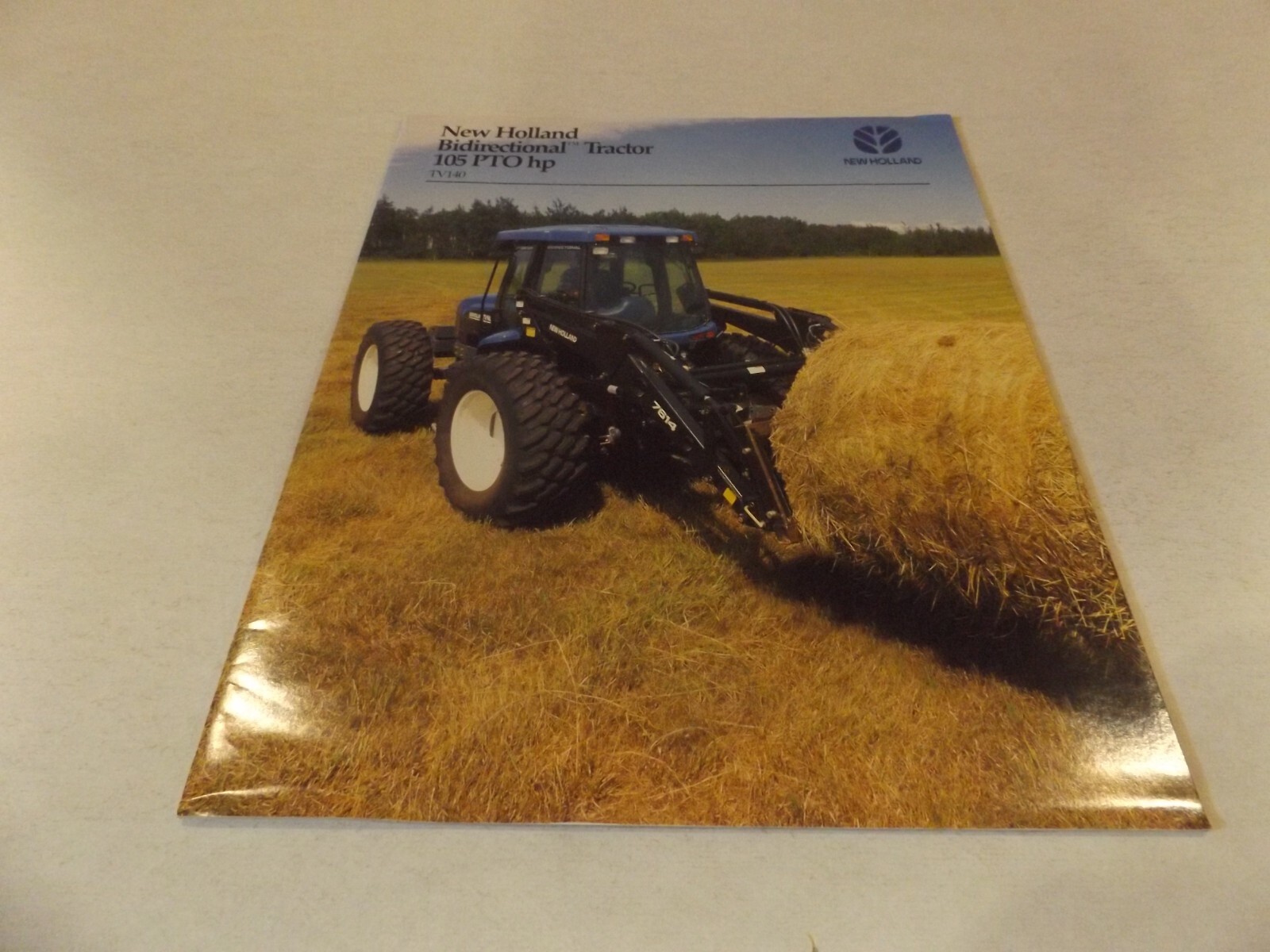 2000 NH BIDIRECTIONAL TRACTOR 105 PTO hp TV140. LIT #31014010