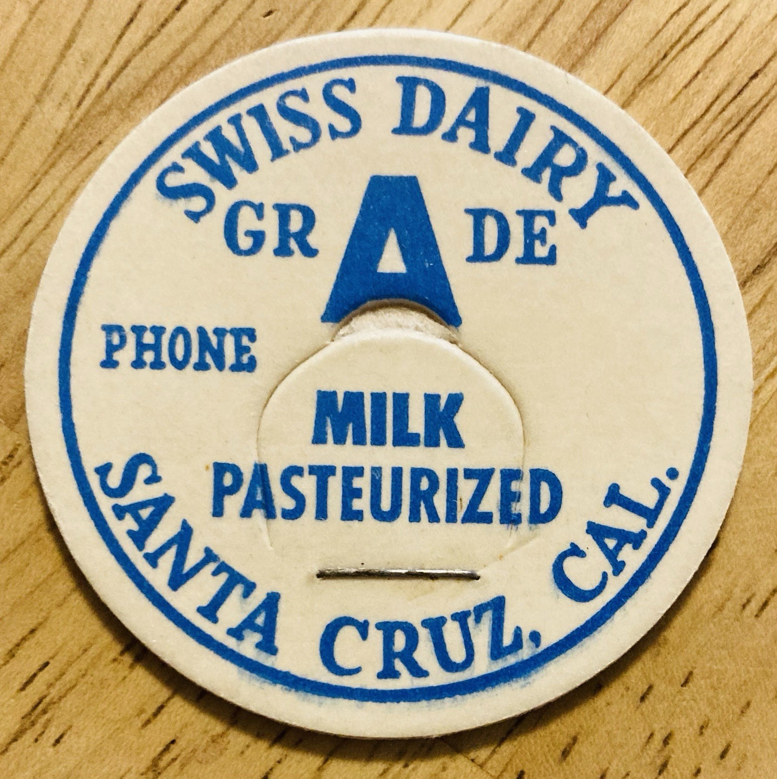MILK BOTTLE CAP~SWISS DAIRY FARM, SANTA CRUZ, CA. GRADE A MILK