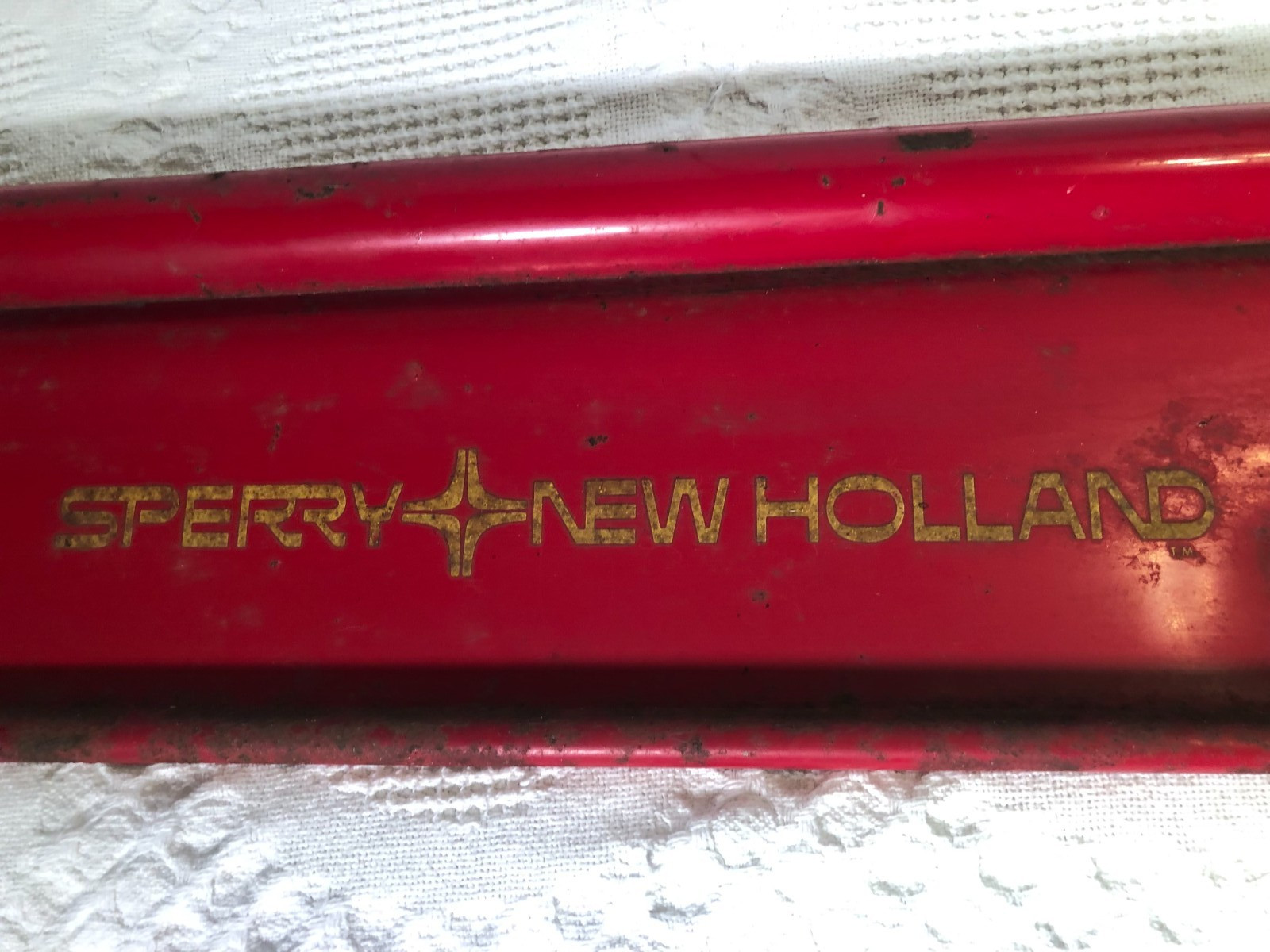Vintage Sperry New Holland tractor implement metal sign cover red