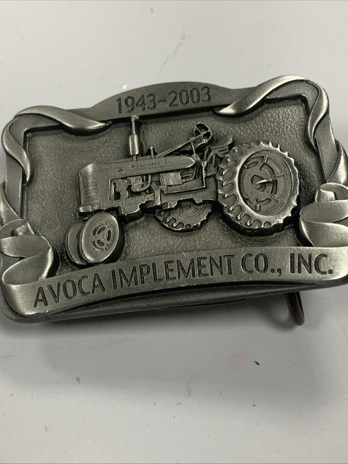 AVOCA IMPLEMENT CO., INC Avoca, IA 60th Anniversary Belt Buckle New Unused
