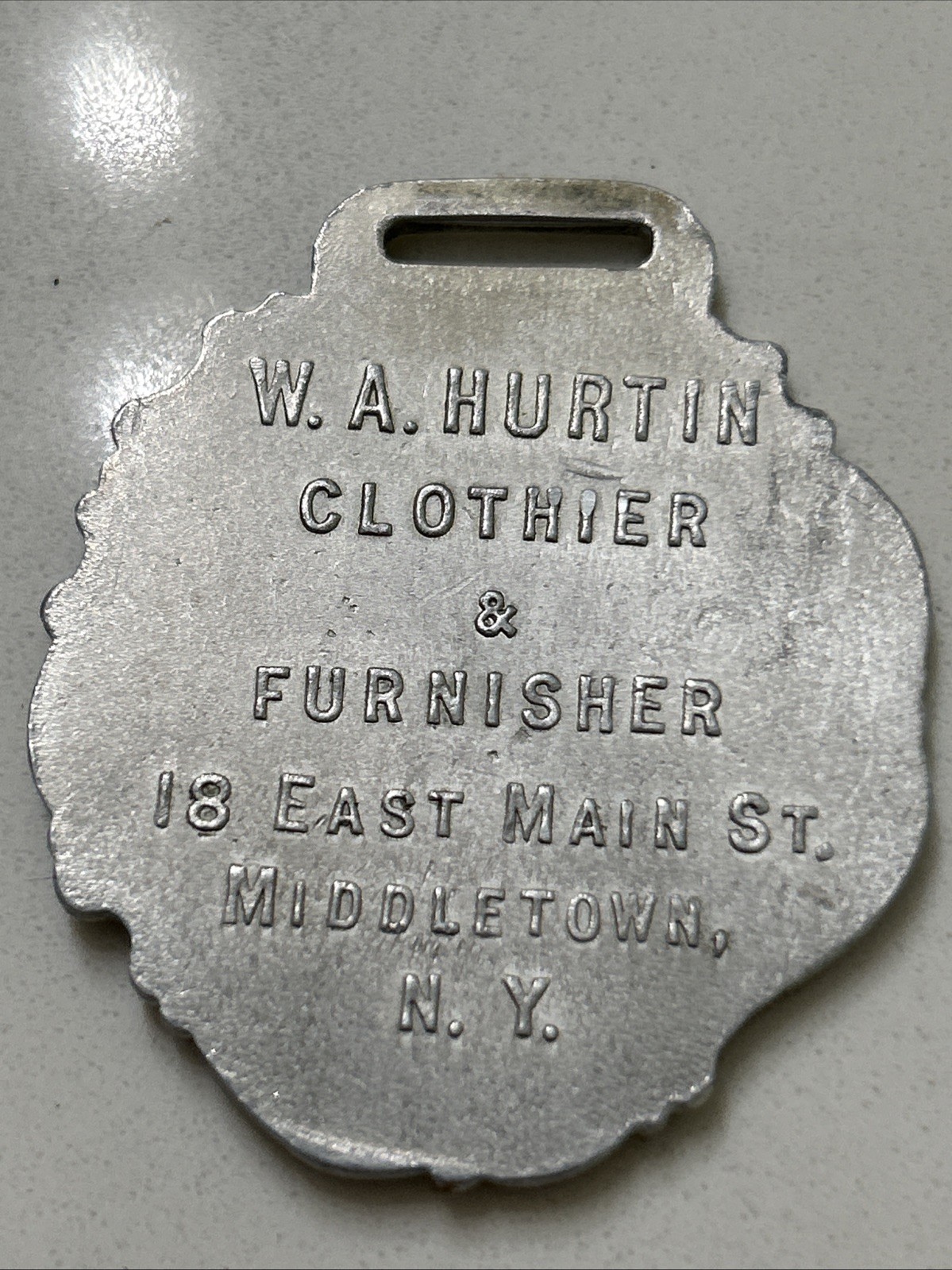 W.A. Hurtin Clothier & Furnisher Aluminum Pocket Watch Fob Middletown NY