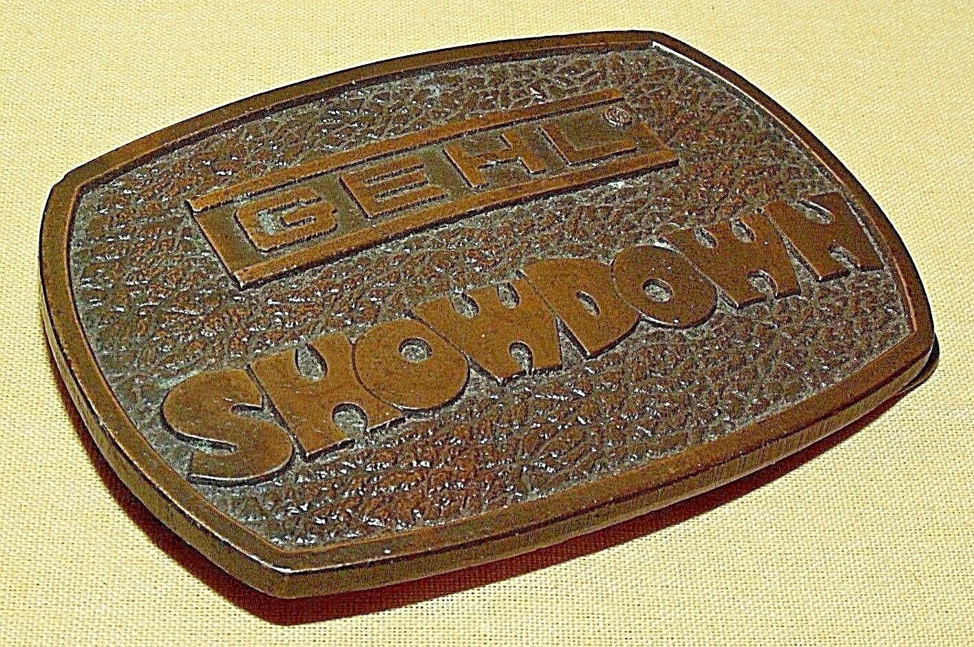 GEHL SHOWDOWN BELT BUCKLE BERGAMOT BRASS WORKS 1976 WI USA FARM IMPLEMENTS OVAL.