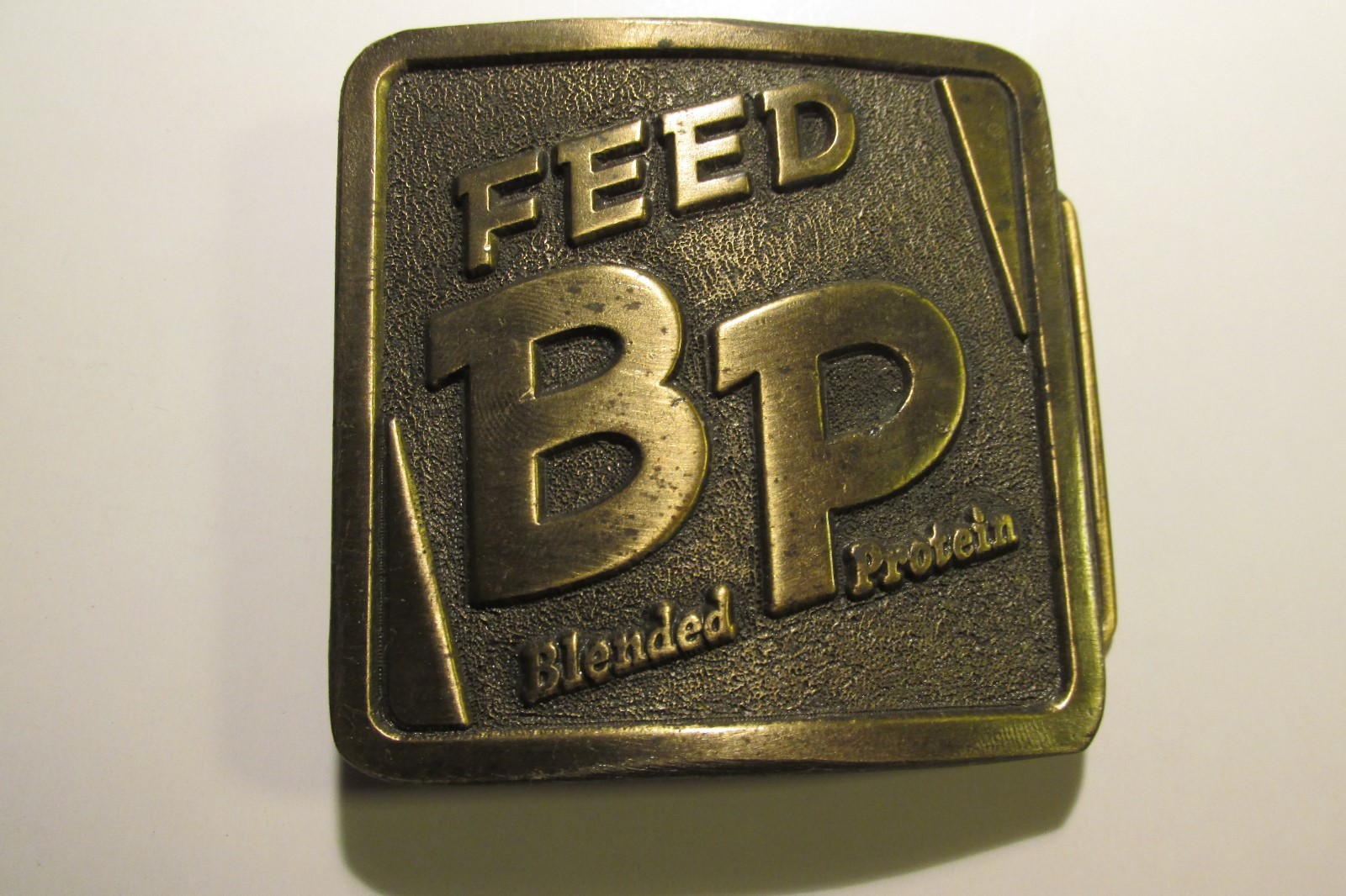 #A Vintage belt buckle Feed BP Blended Protein Farm Cattle livestock 1977 IL