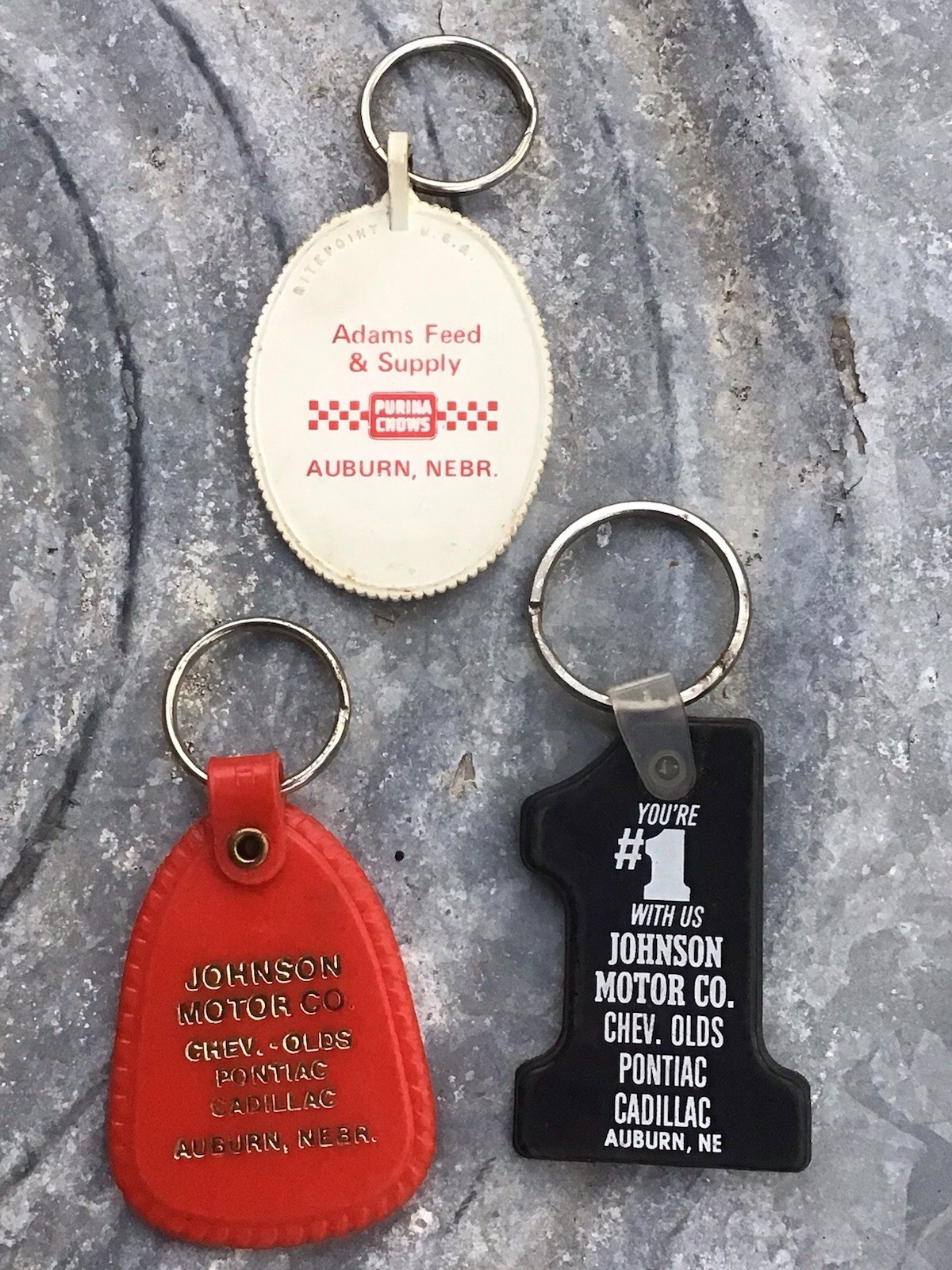 3 Vintage Auburn Nebraska Advertising Key Chain Johnson Motors & Adam’s Purina