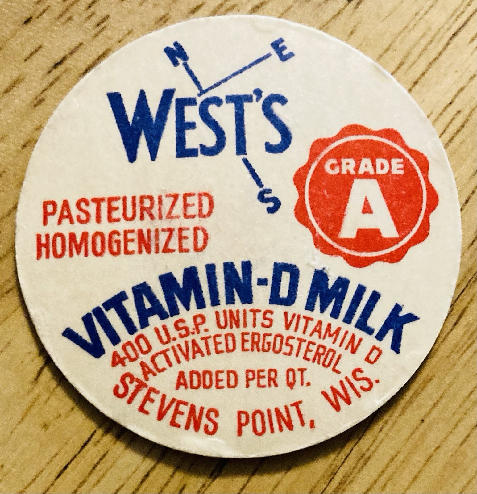 MILK BOTTLE CAP~WEST’S DAIRY FARM, STEVENS POINT, WIS.