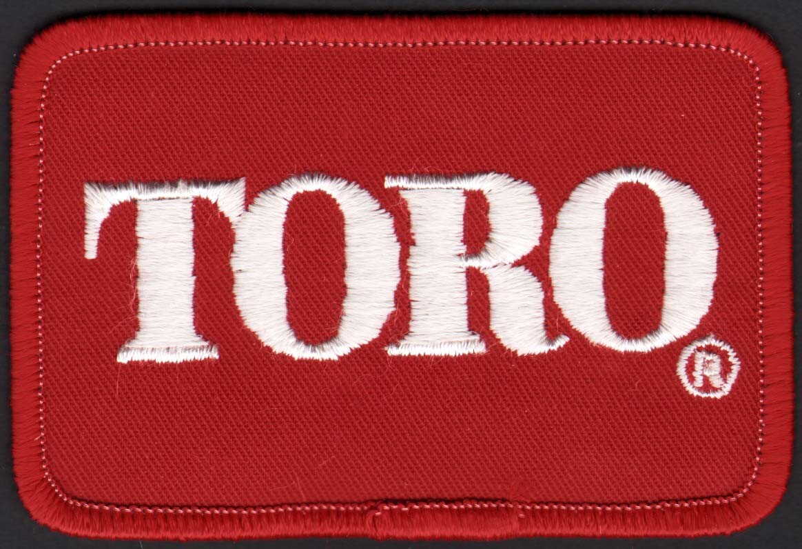 Vintage uniform patch TORO red and white unused new old stock n-mint+ condition