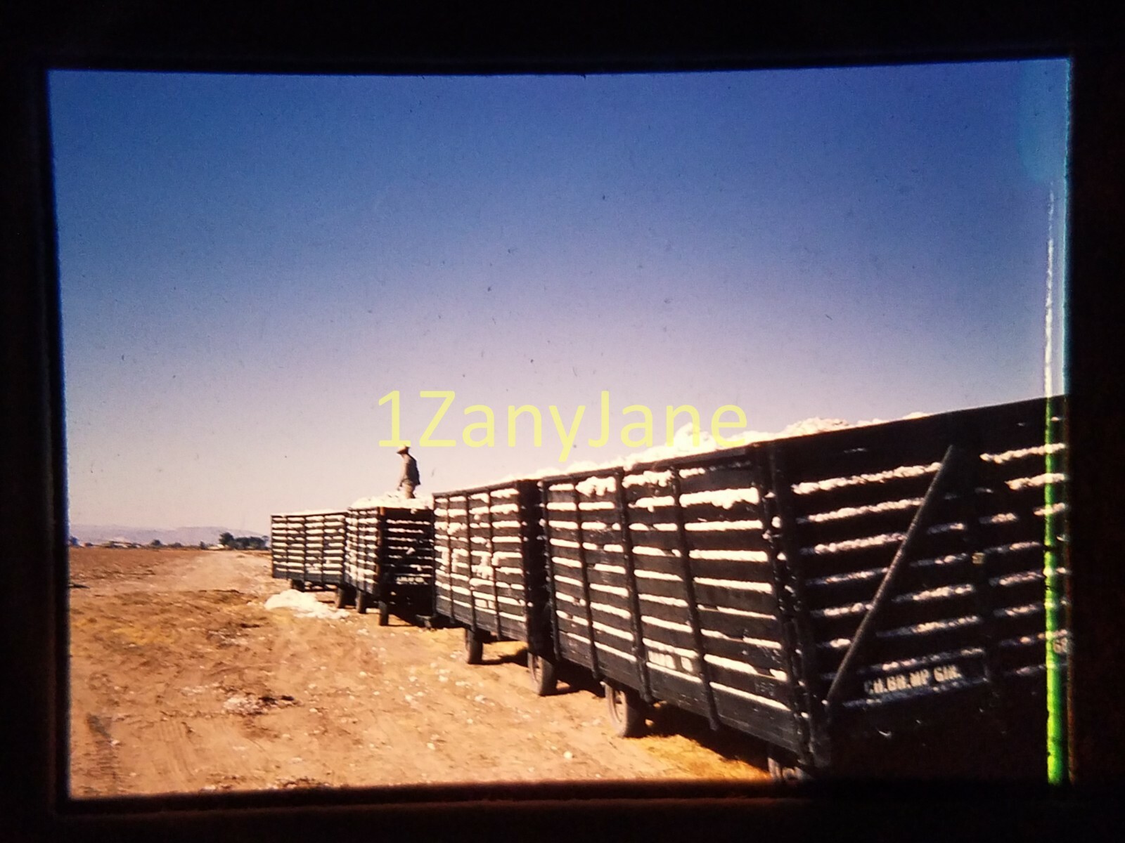 AC1214 35mm Slide of an Allis-Chalmers from MEDIA ARCHIVES WAGONS/PICKED COTTON