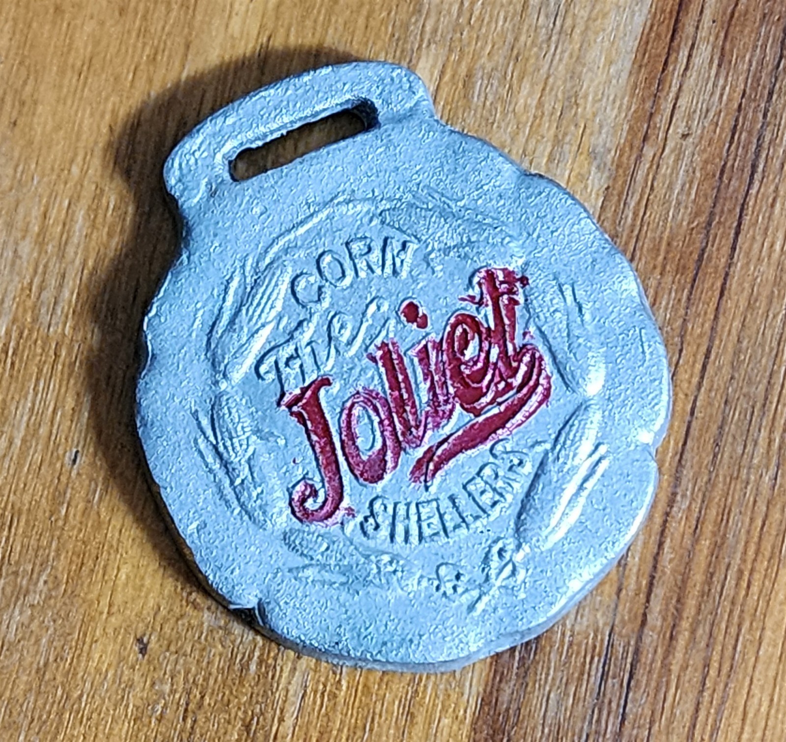 ANTIQUE JOLIET CORN SHELLERS METAL WATCH FOB NOT HOW CHEAP BUT HOW GOOD 1-5/8&Prime;
