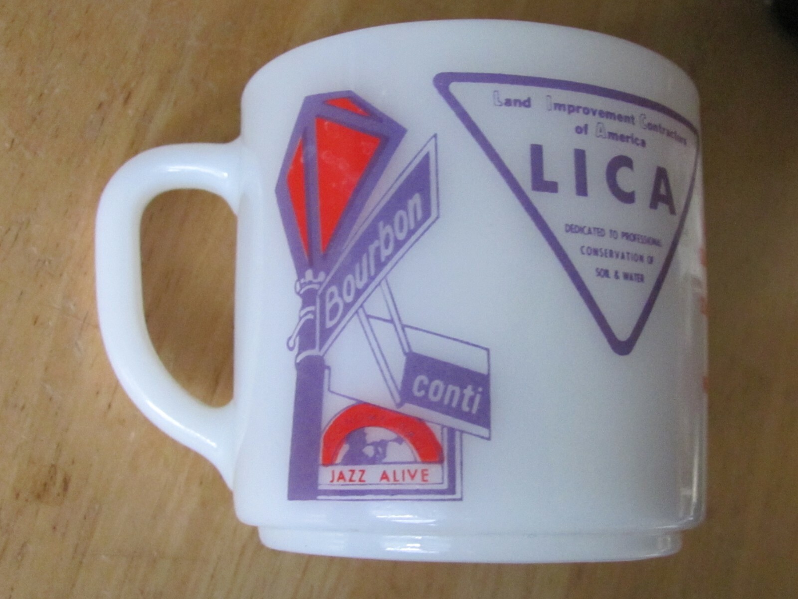 1973 MILK GLASS COFFEE CUP NEW ORLEANS LICA LAND IMPROVEMENT CONTRACTORS FARM