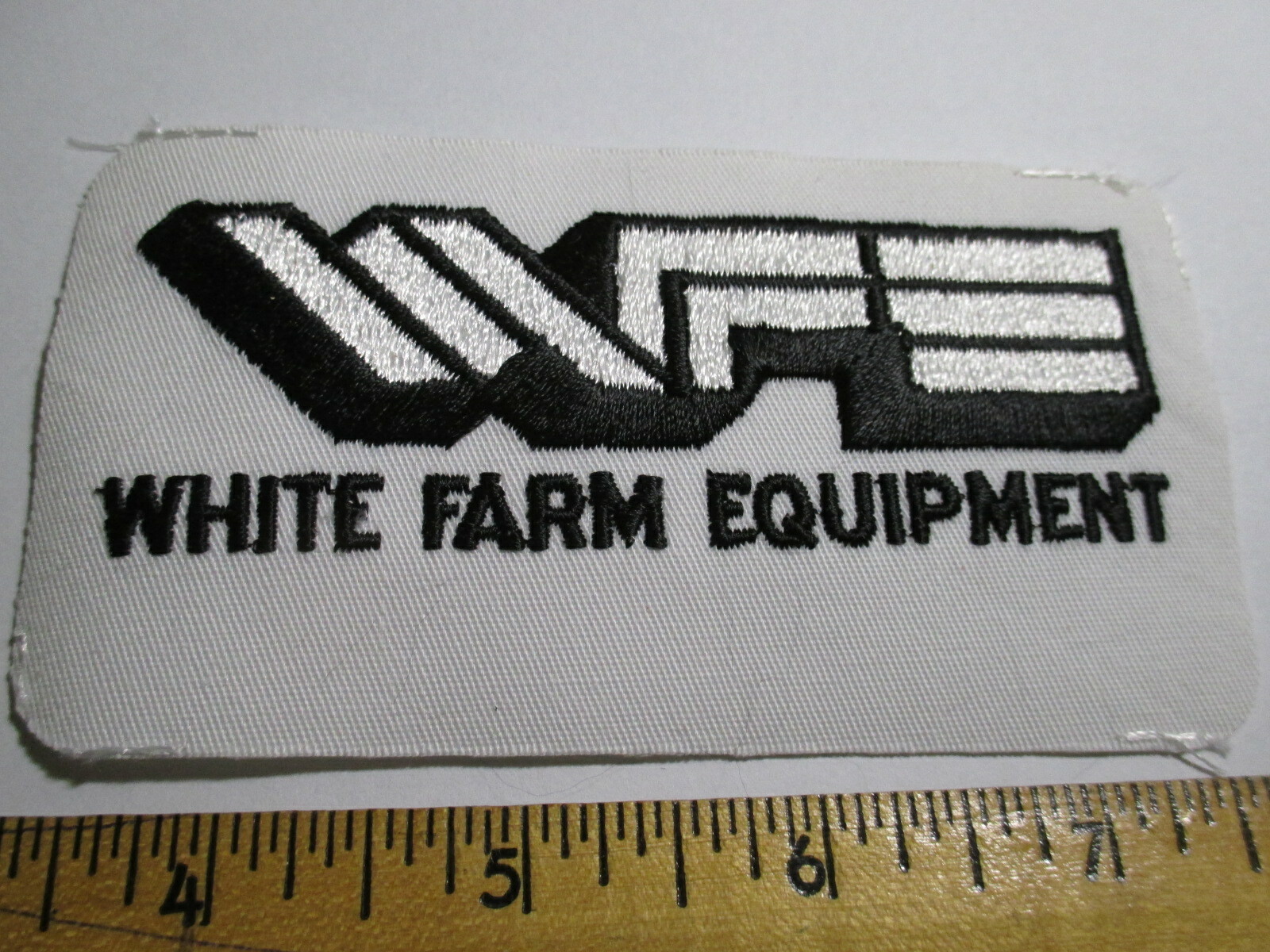 White Farm Equipment Patch WFE NOS Embroidered Agriculture Heavy Equip