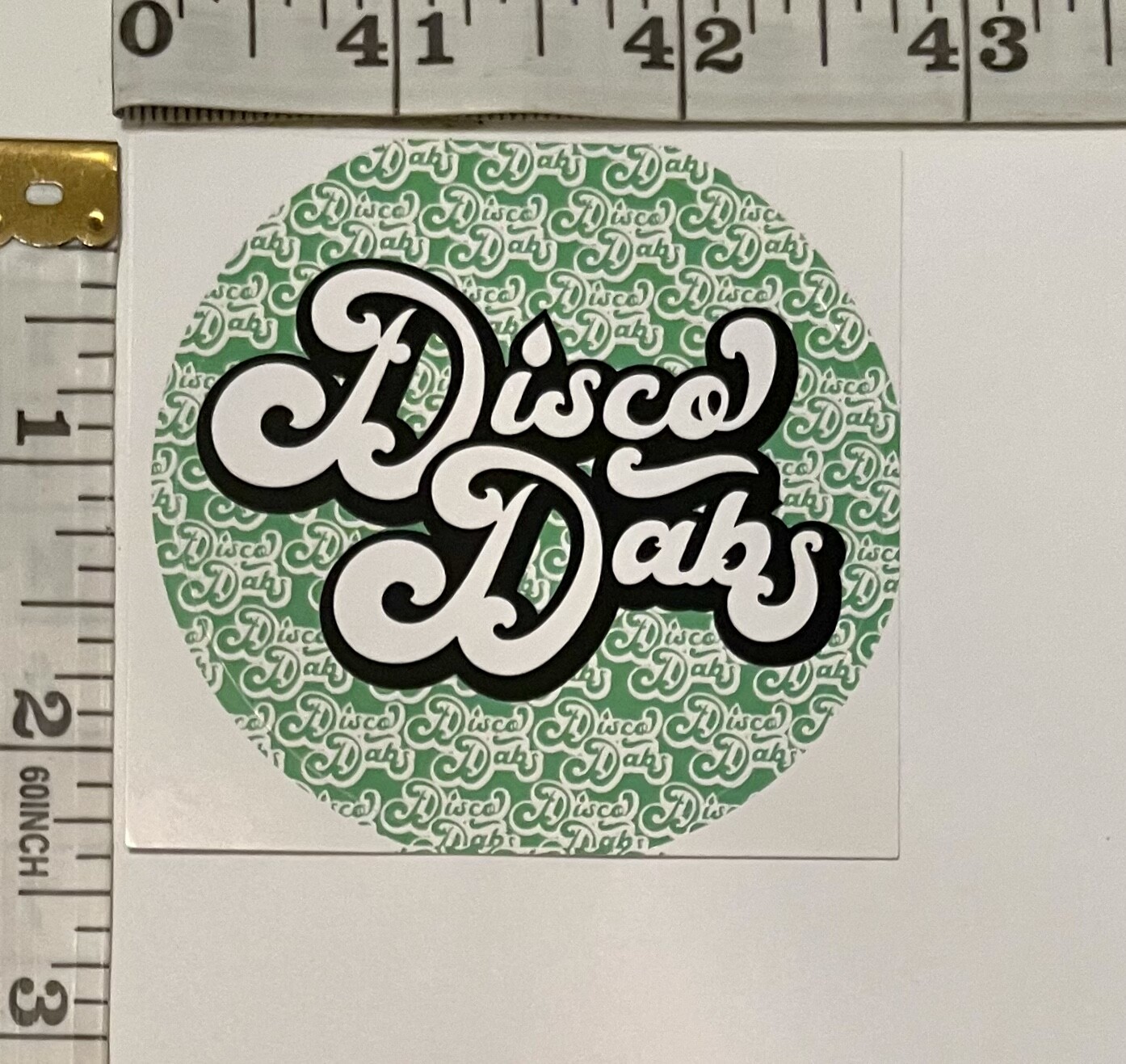Disco Dabs 2.5&Prime; ROUND GLOSSY PAPER STICKER; OREGON, USA CANNABIS CONCENTRATE AD