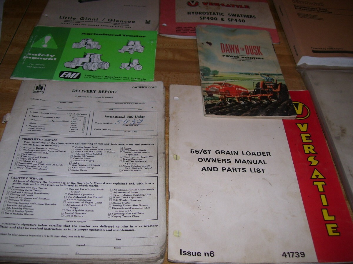 Lot #16G Farm Equipment Manuals IHC 300 Tractor Caterpillar Woods Versatile