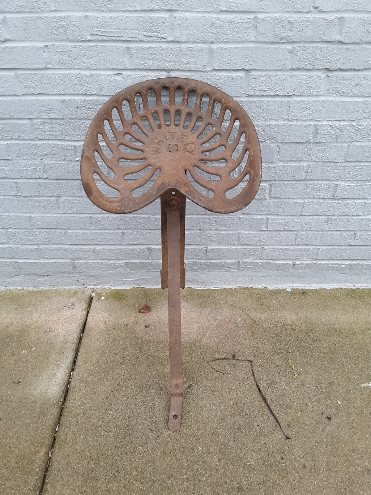 Antique Whitely Cast Iron Farm Tractor seat with original Assembly Post bracket