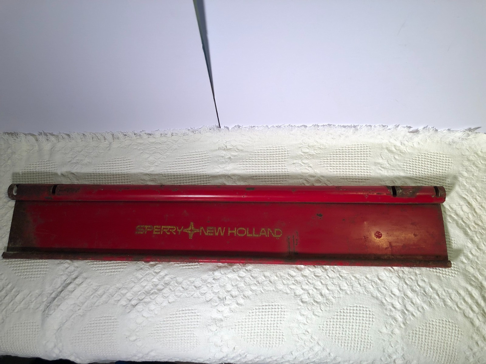Vintage Sperry New Holland tractor implement metal sign cover red